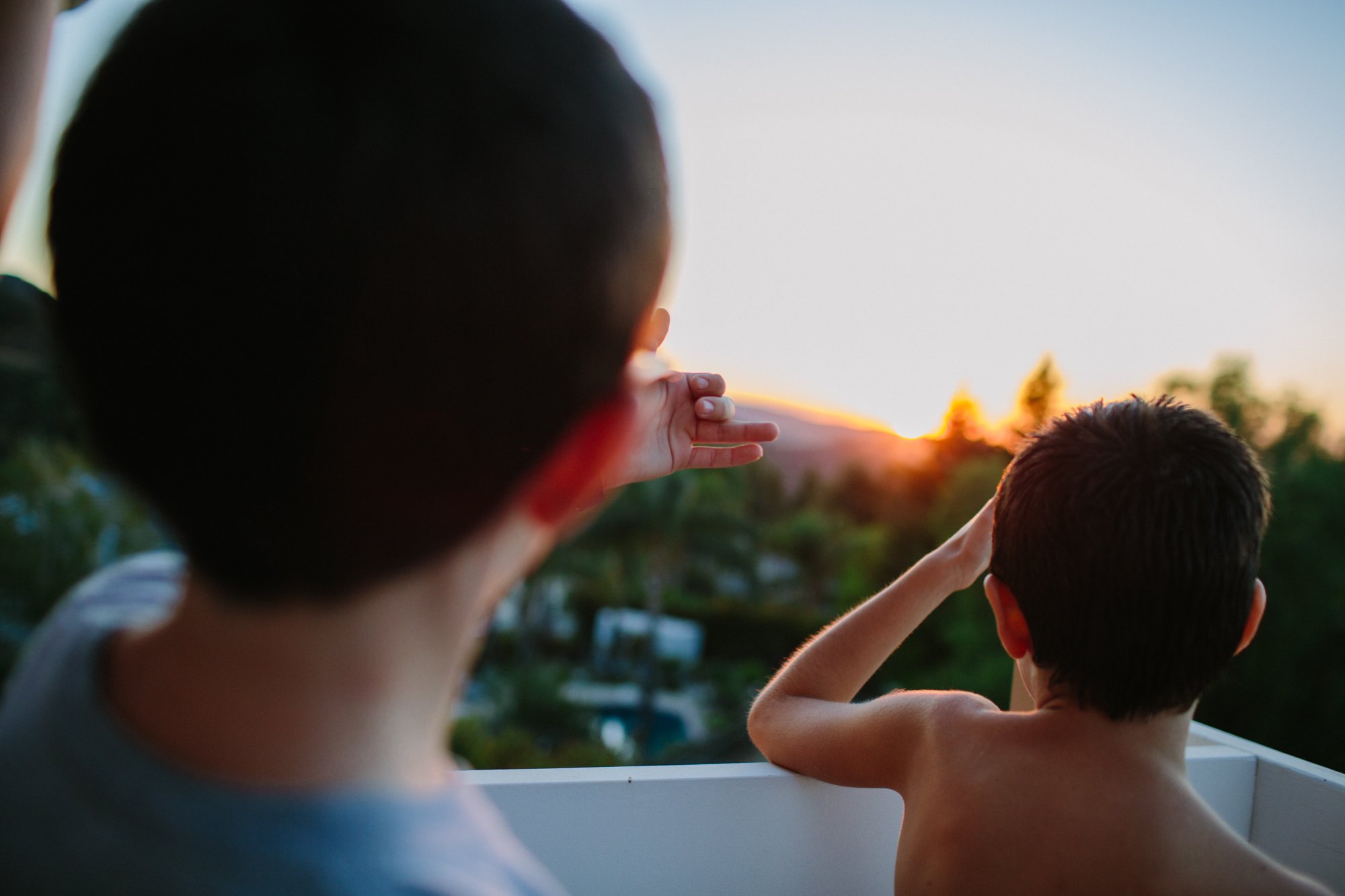 kids watch sunset - Documentary Family Photography