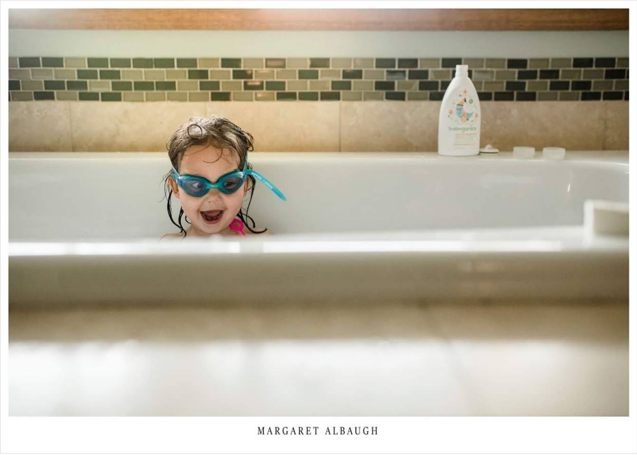girl with goggles in tub - Documentary Family Photography