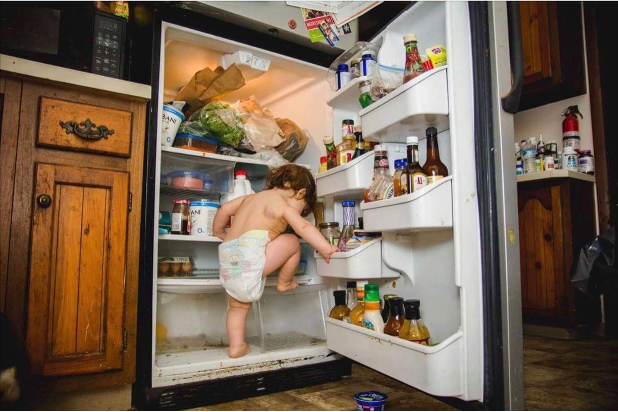 child in fridge - Documentary Family Photography