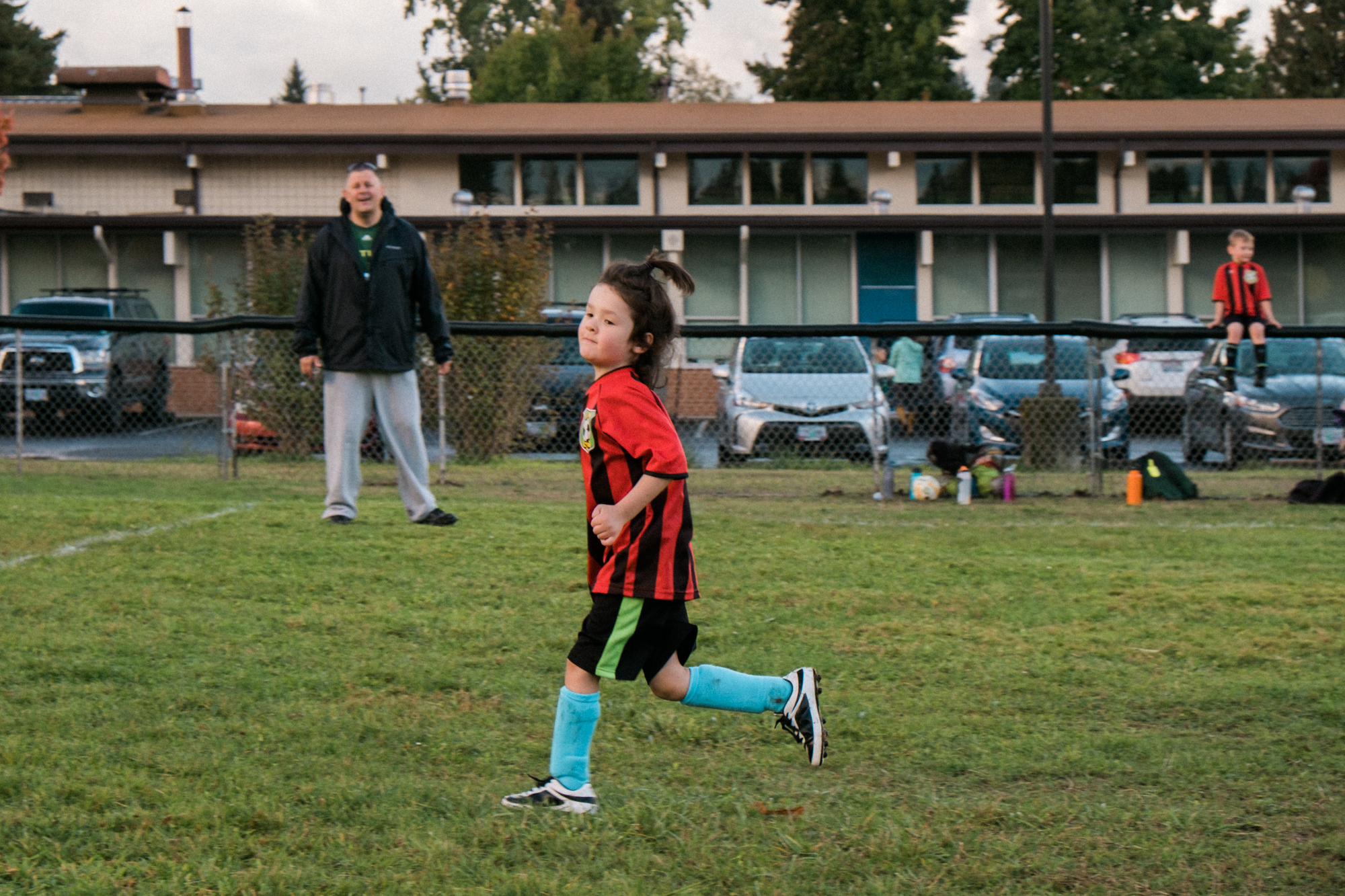 Boy playing soccer - Documentary Family Photography