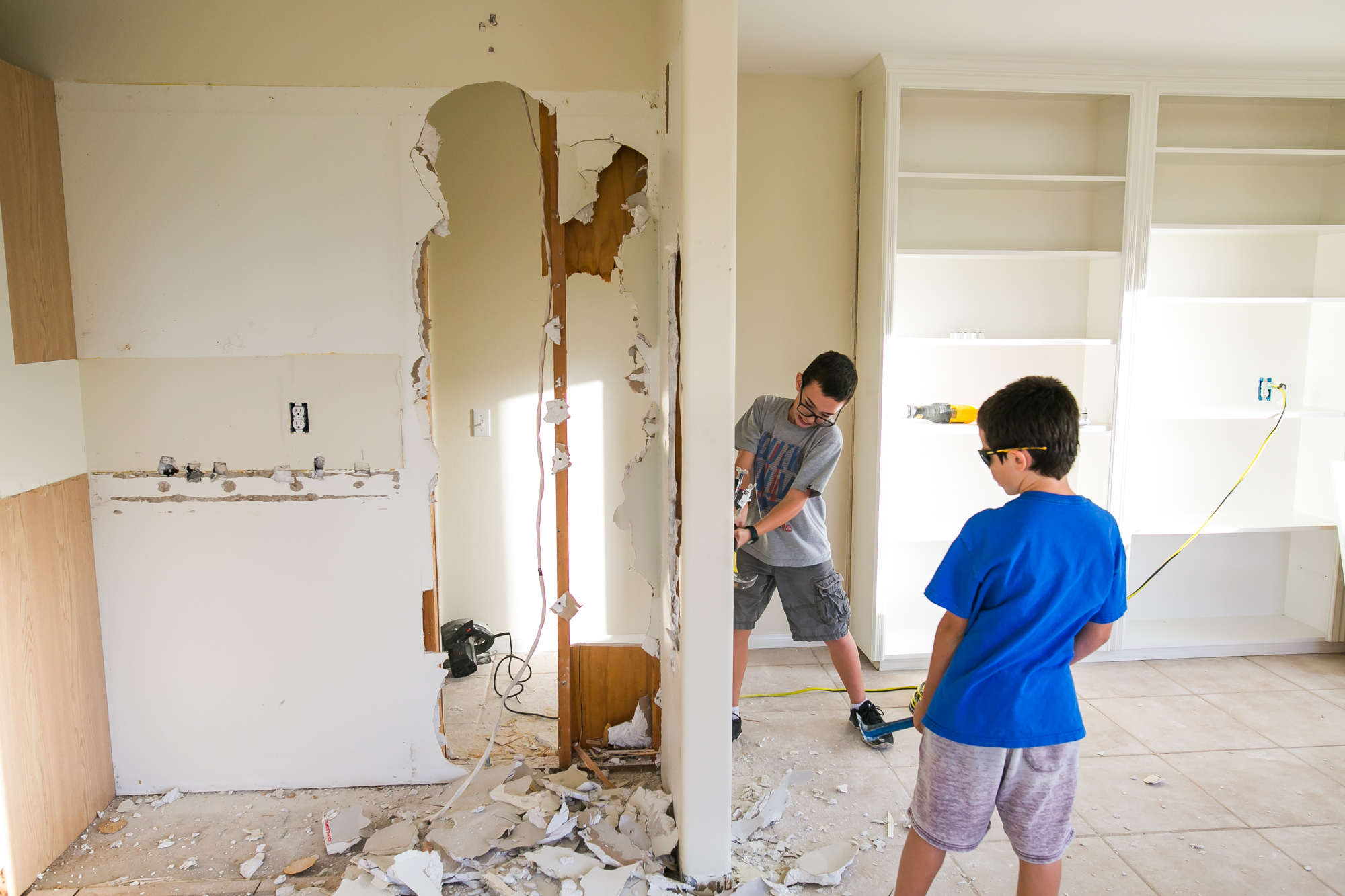 kids help with home demolition - Documentary Family Photography