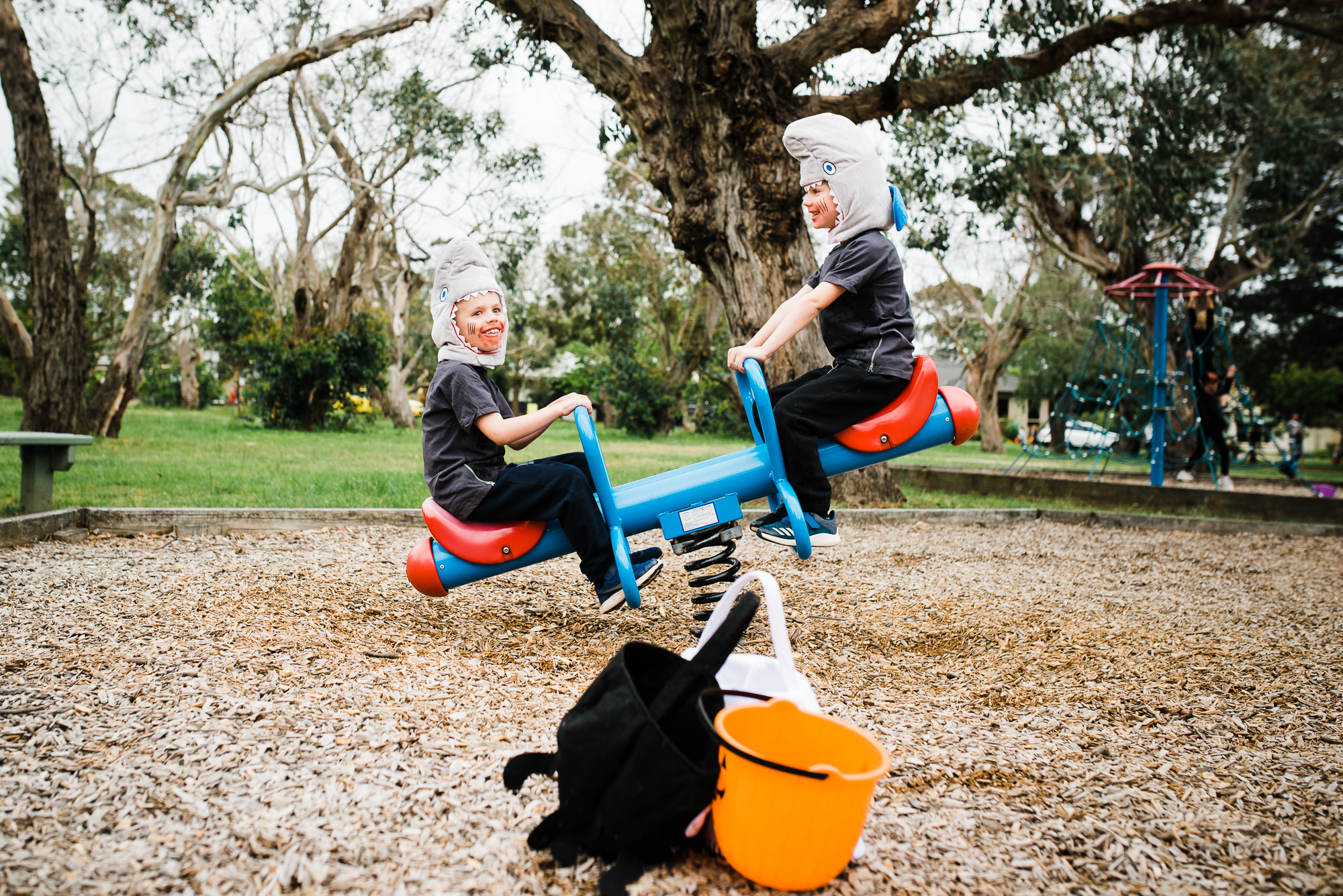 boys on seesaw - documentary family photography