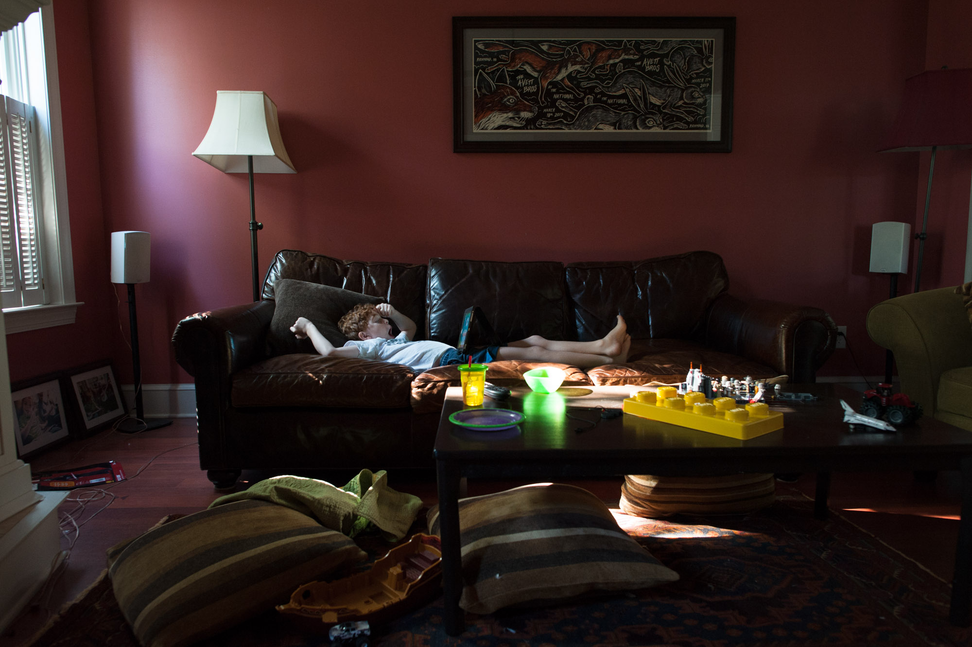 boy asleep on couch - documentary family photography