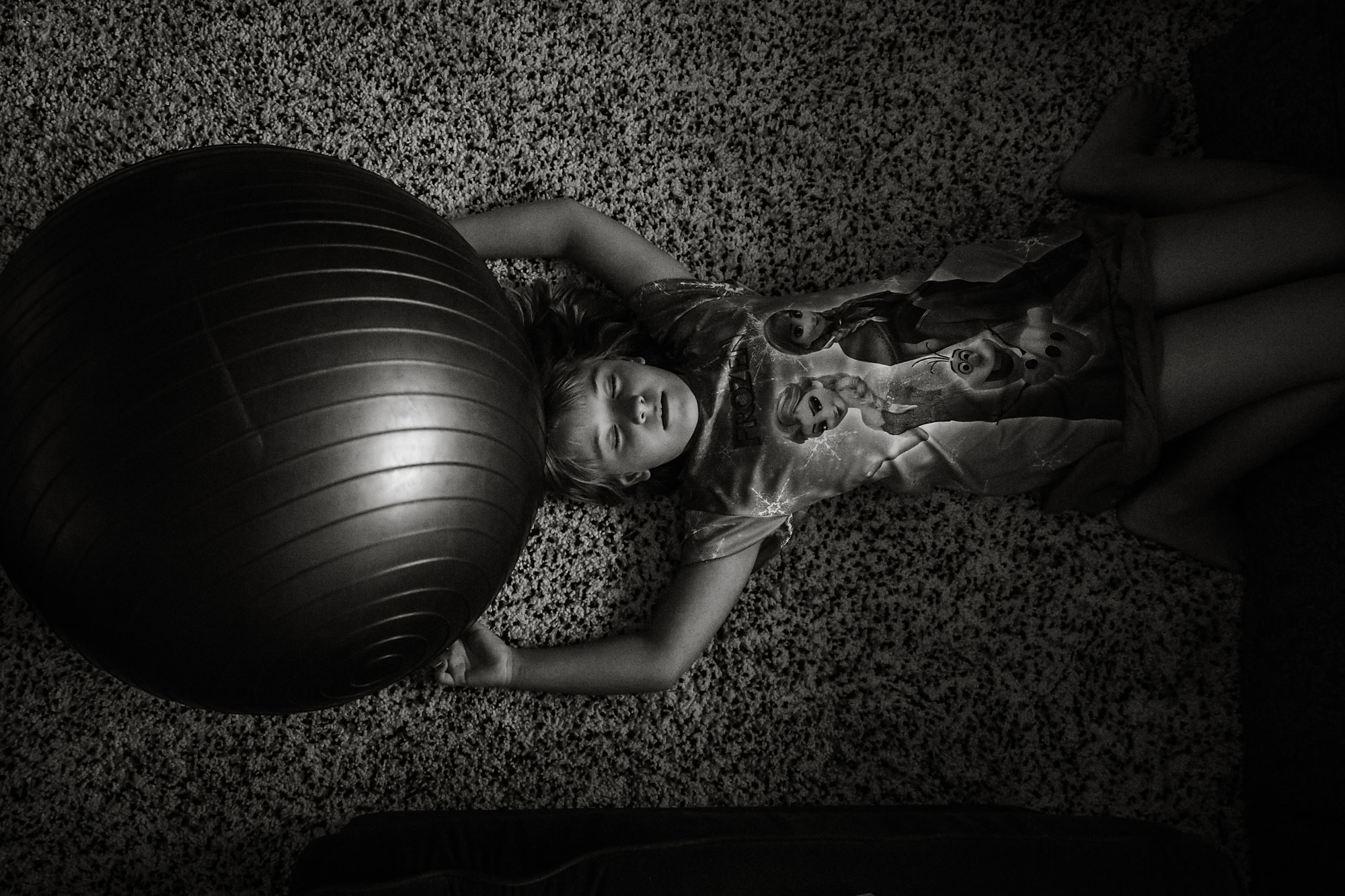 girl with exercise ball - documentary family photography