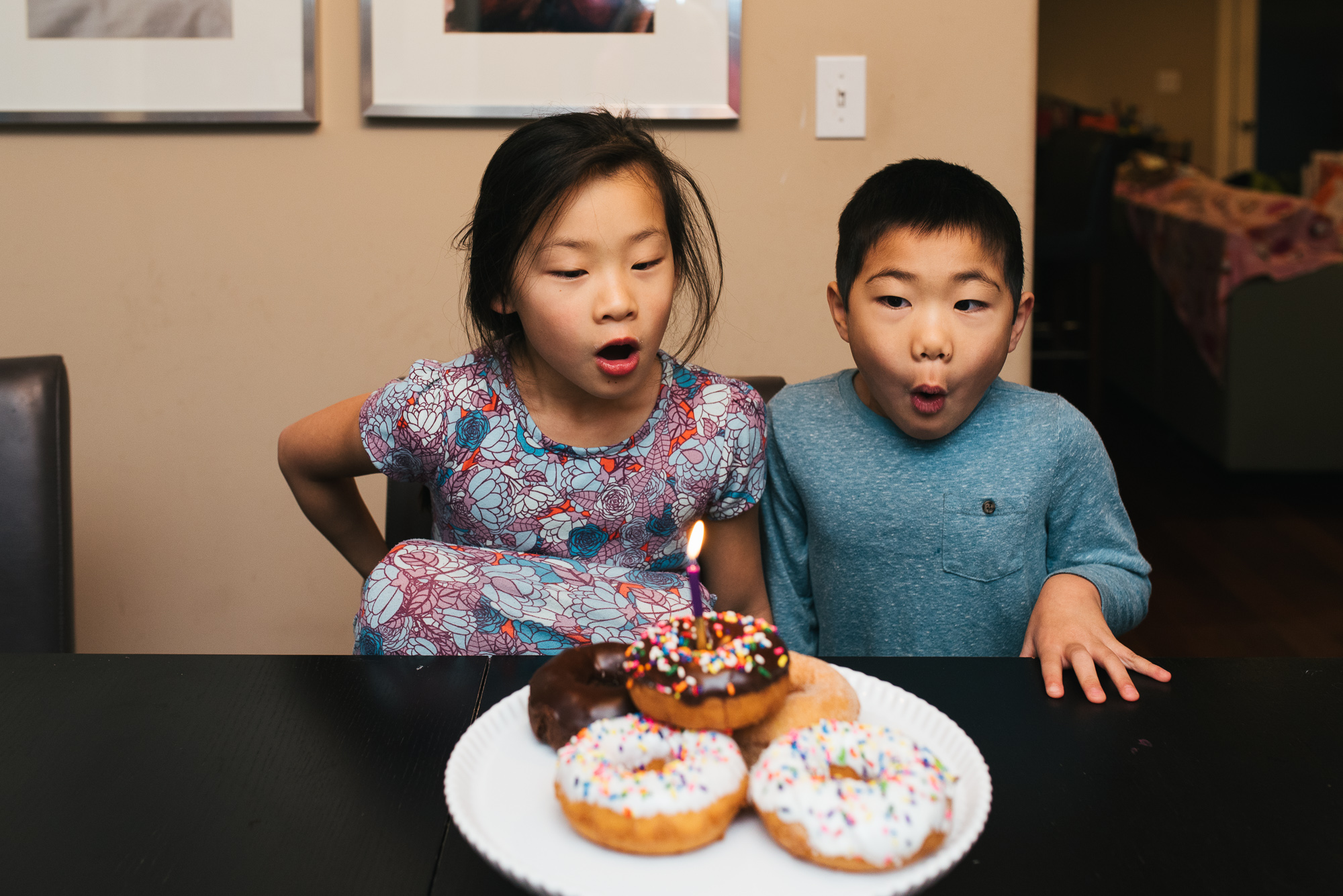 kids with birthday doughnuts - documentary family photography