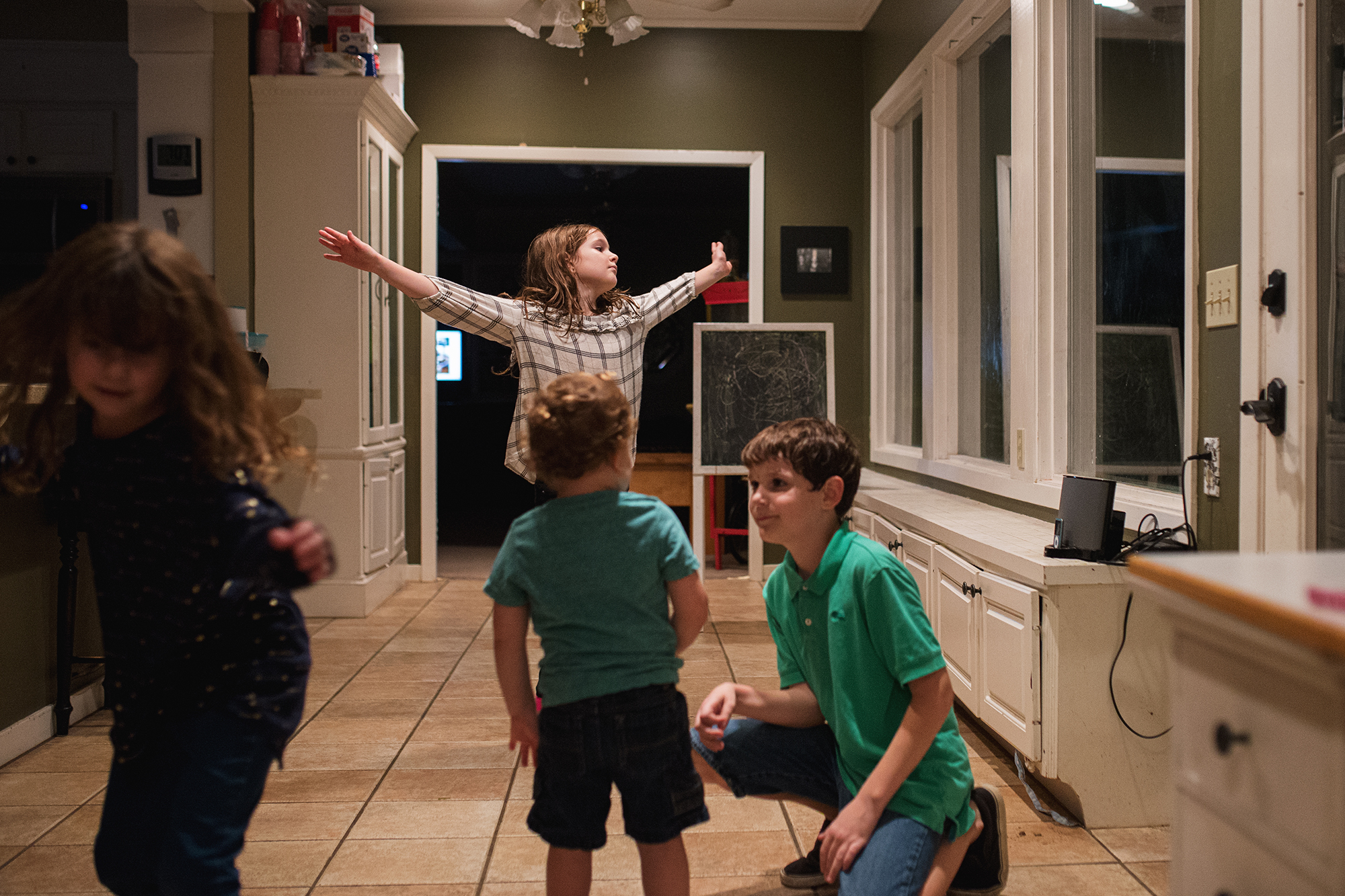 kids dancing in kitchen - Documentary Family Photography