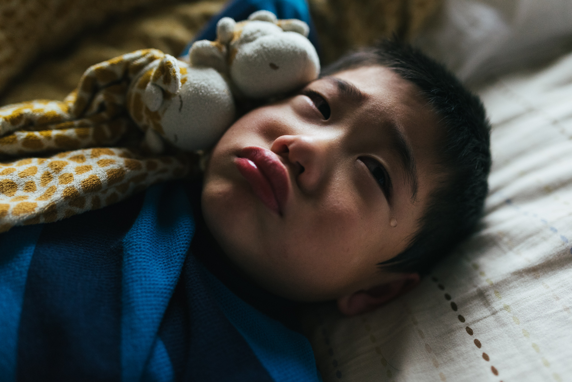 boy pouts - Documentary Family Photography