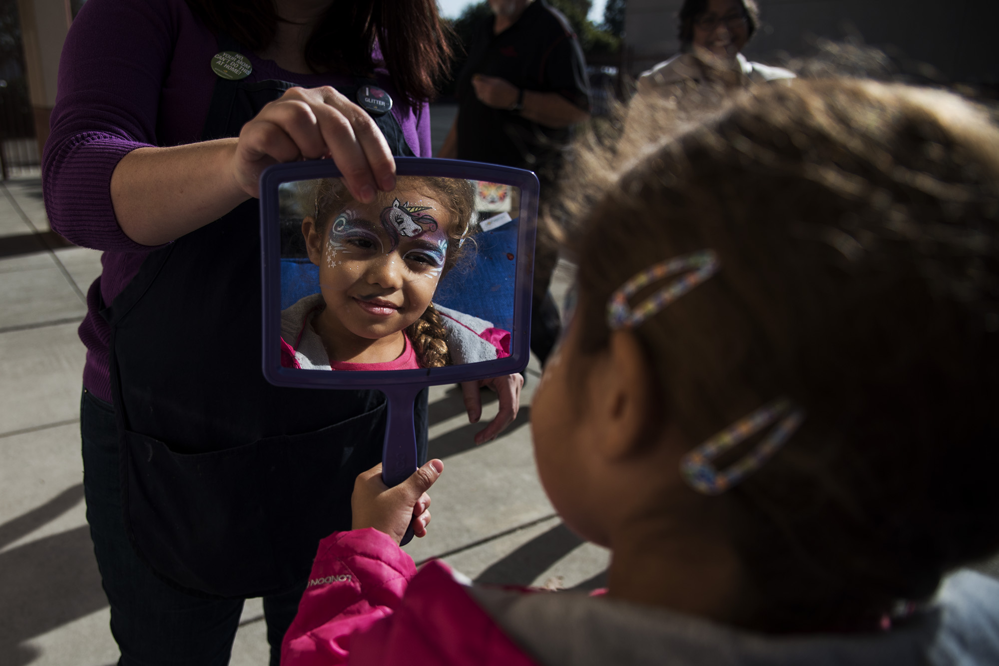 girl with face paint - documentary family photography