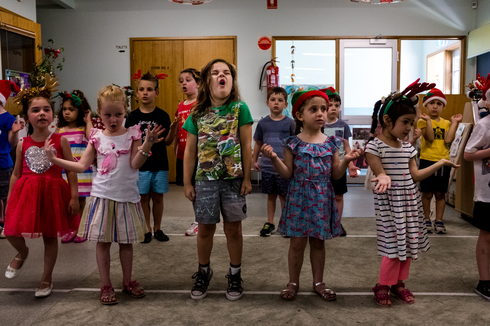 kids singing in school - documentary family photography