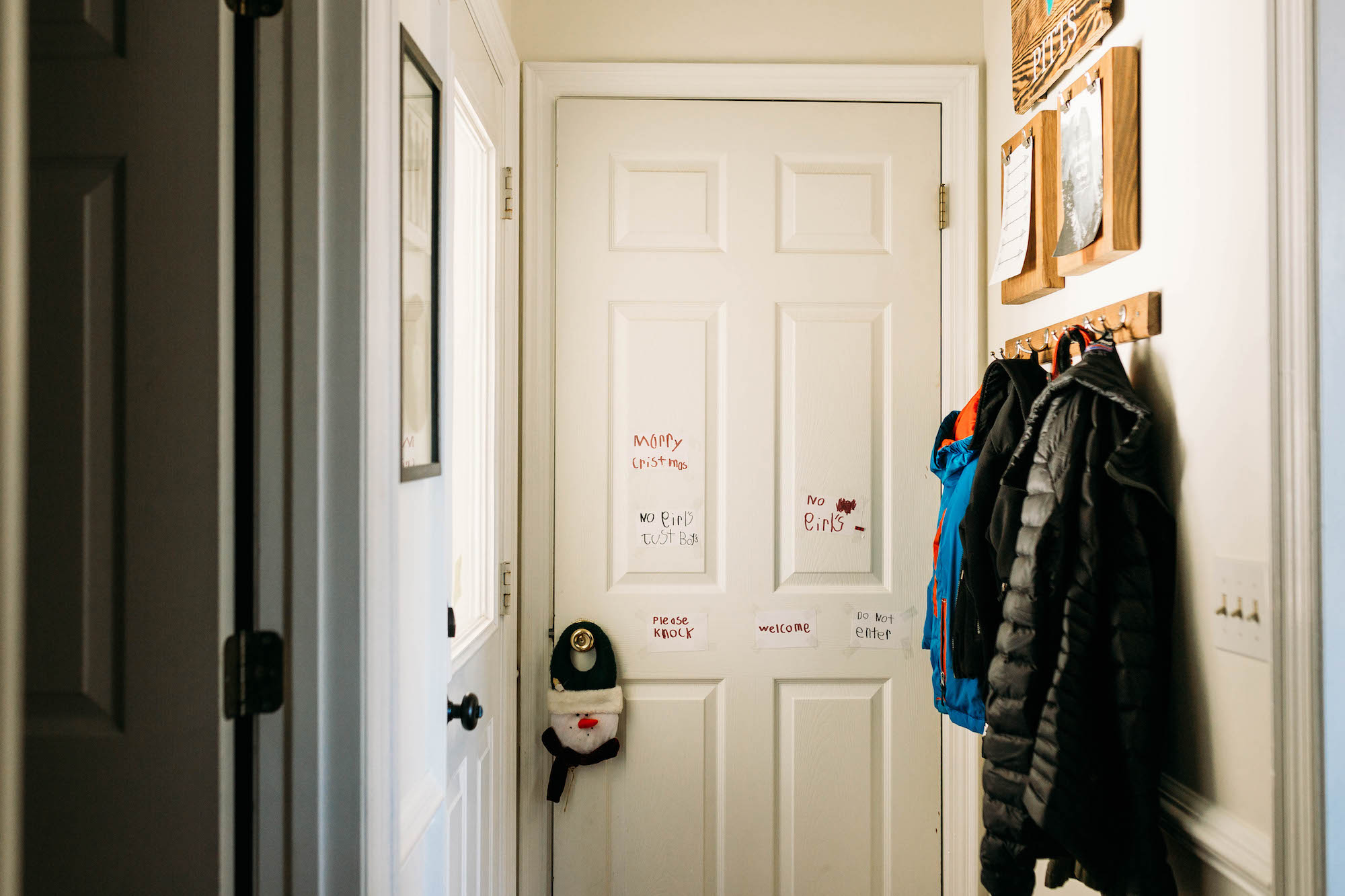 writing on front door - Documentary family photography