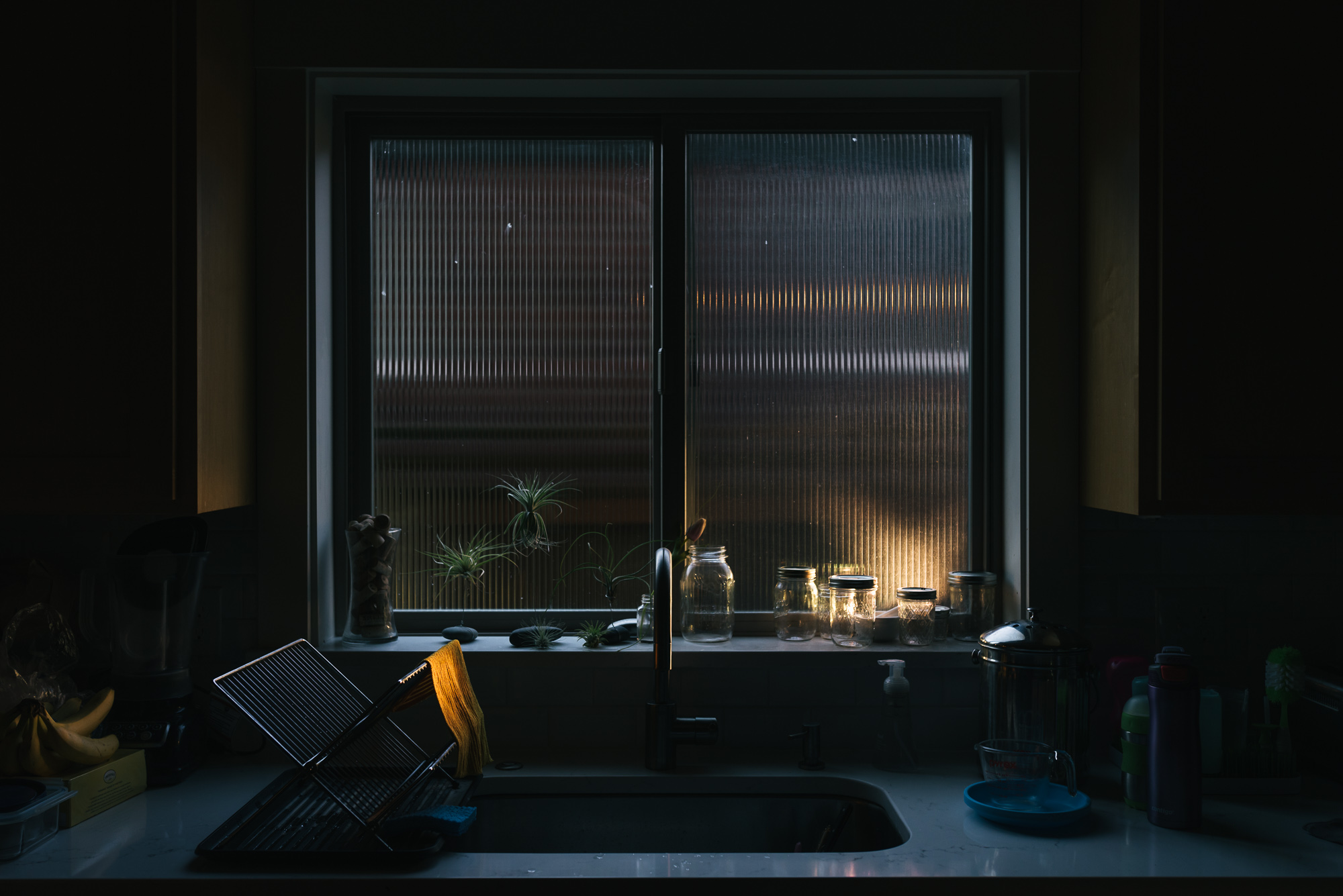 light on kitchen sink - Documentary family photography