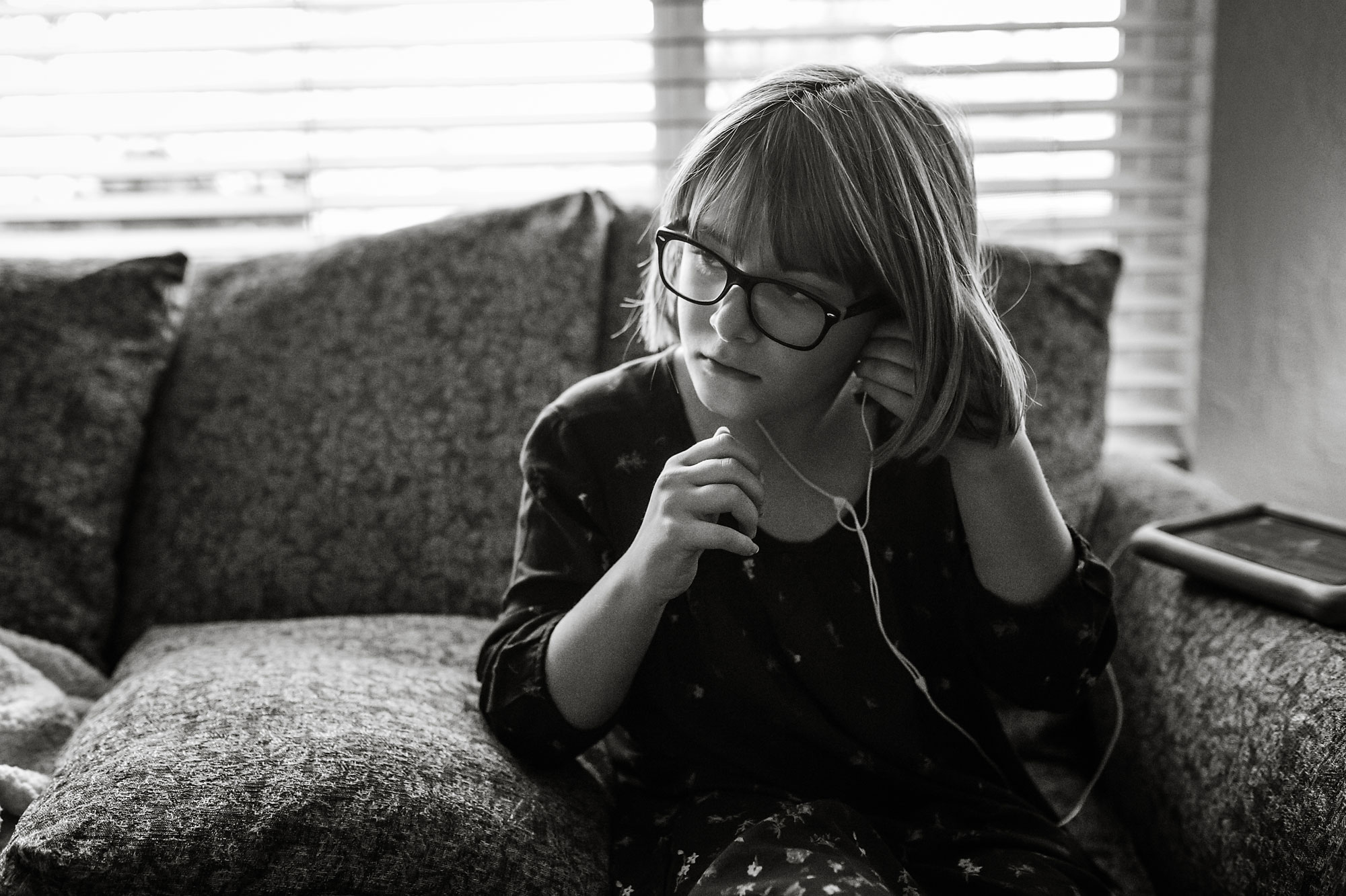 girl listening to ear buds - Documentary Family Photography