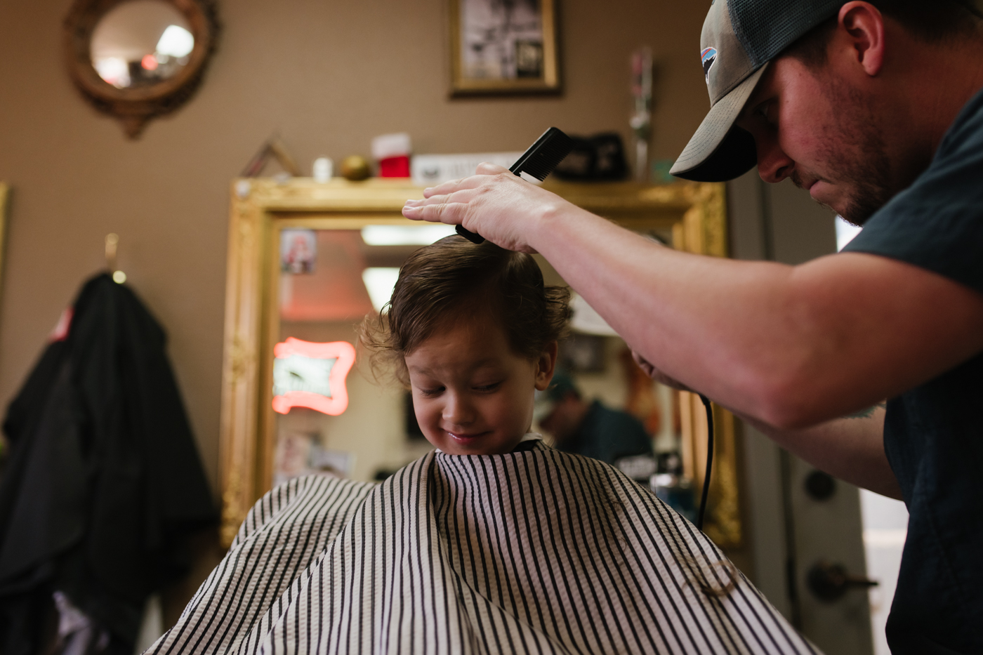 boy getting haircut - Documentary Family Photography