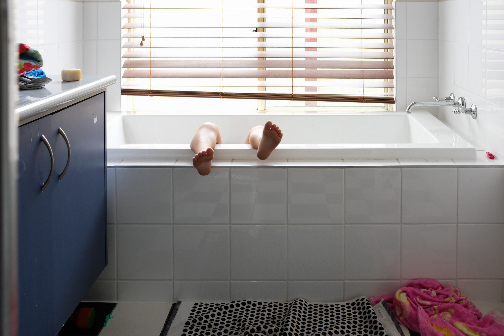 kids feet over tub - Documentary Family Photography
