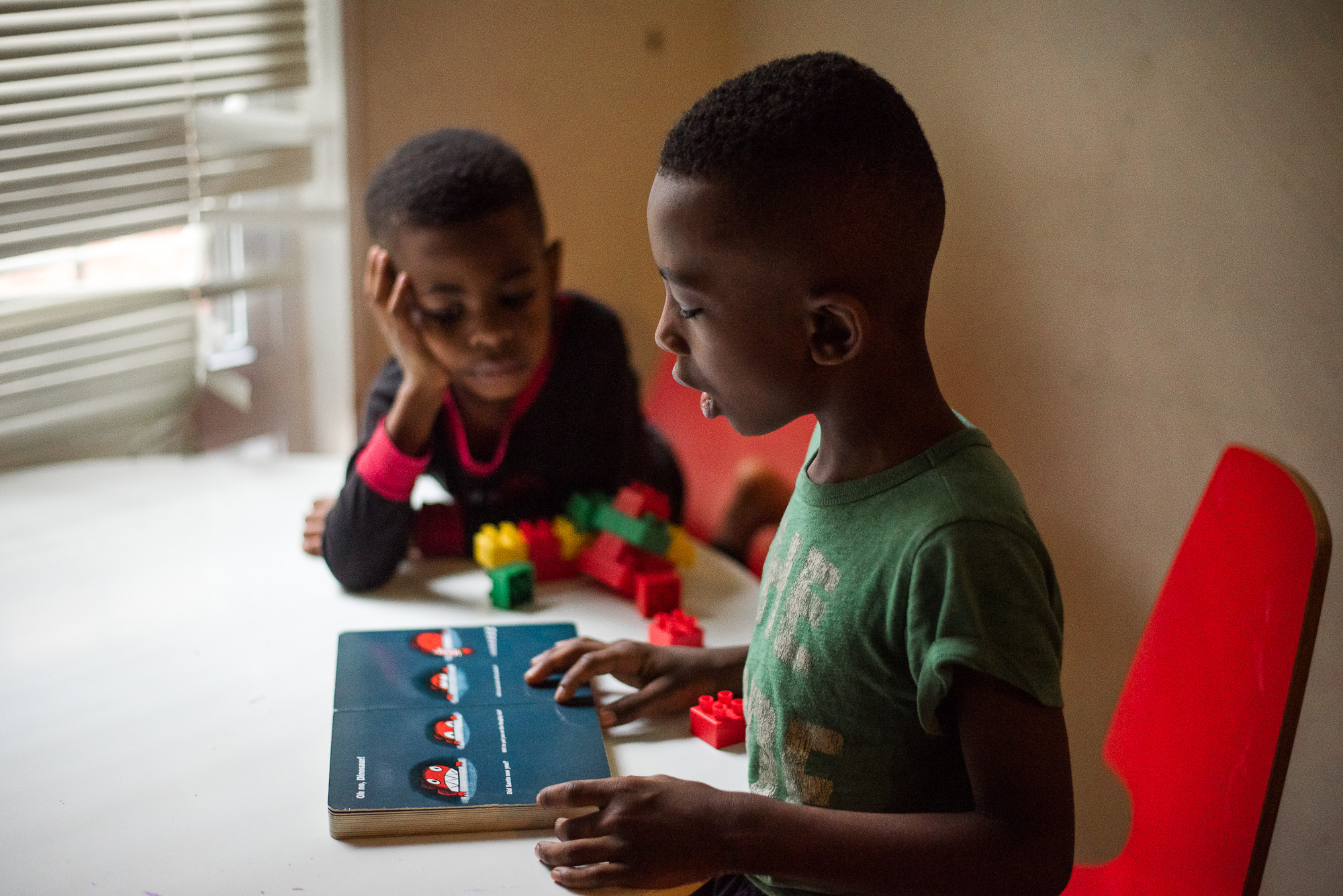 boys reading documentary family photography