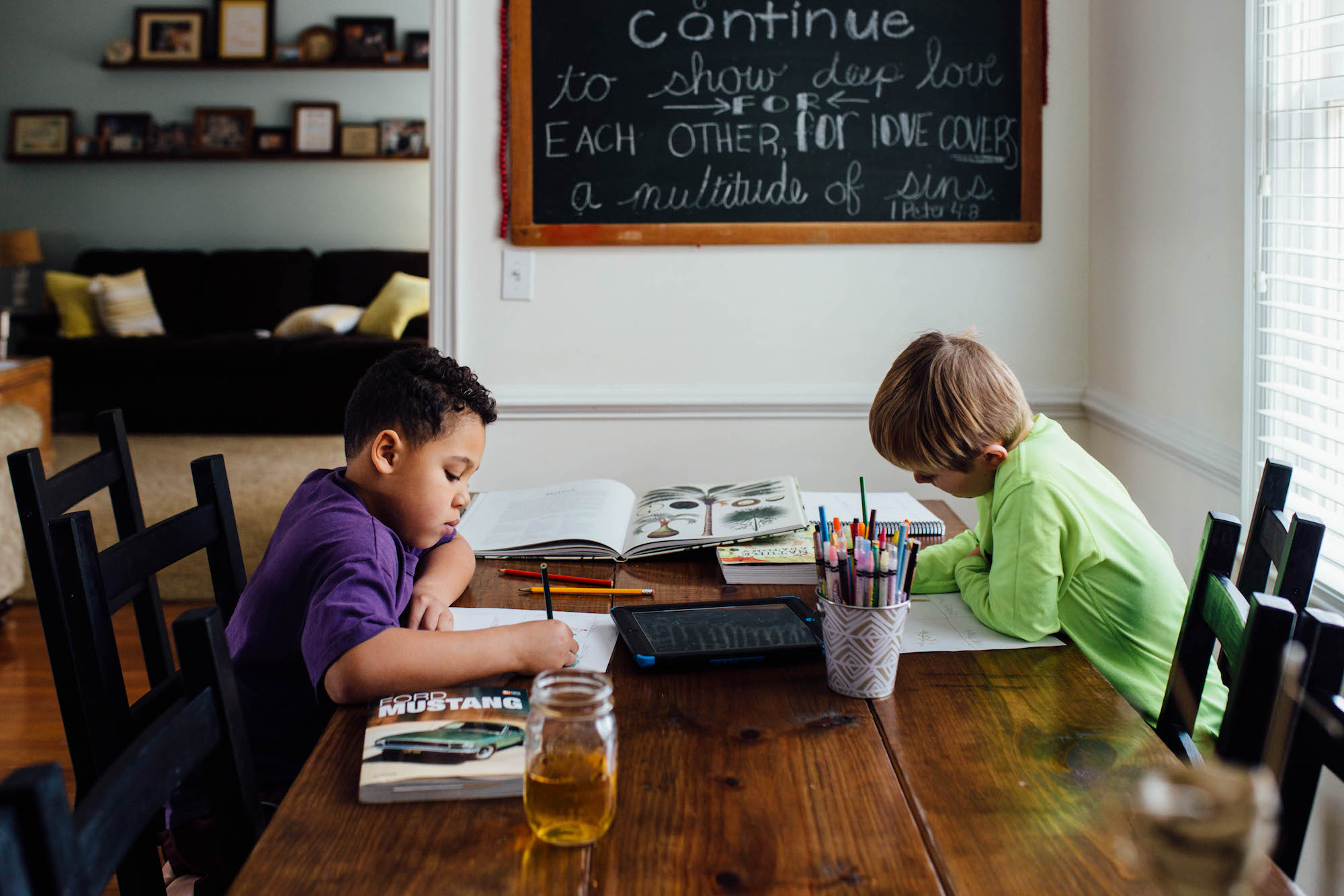 boys at table doing homework - documentary family photography