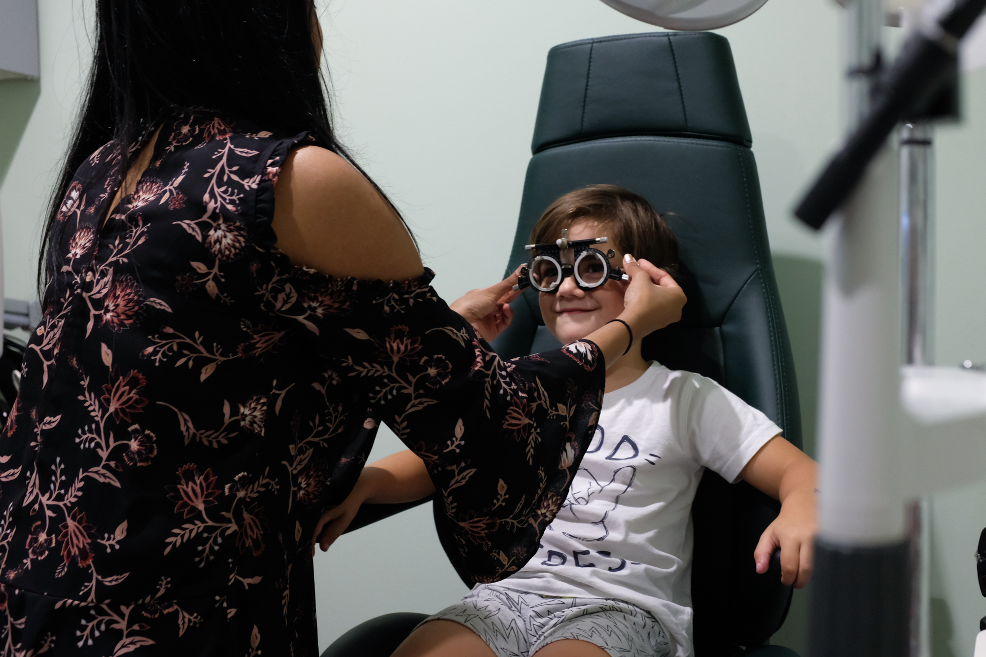 boy at optometrist - Documentary Family Photography