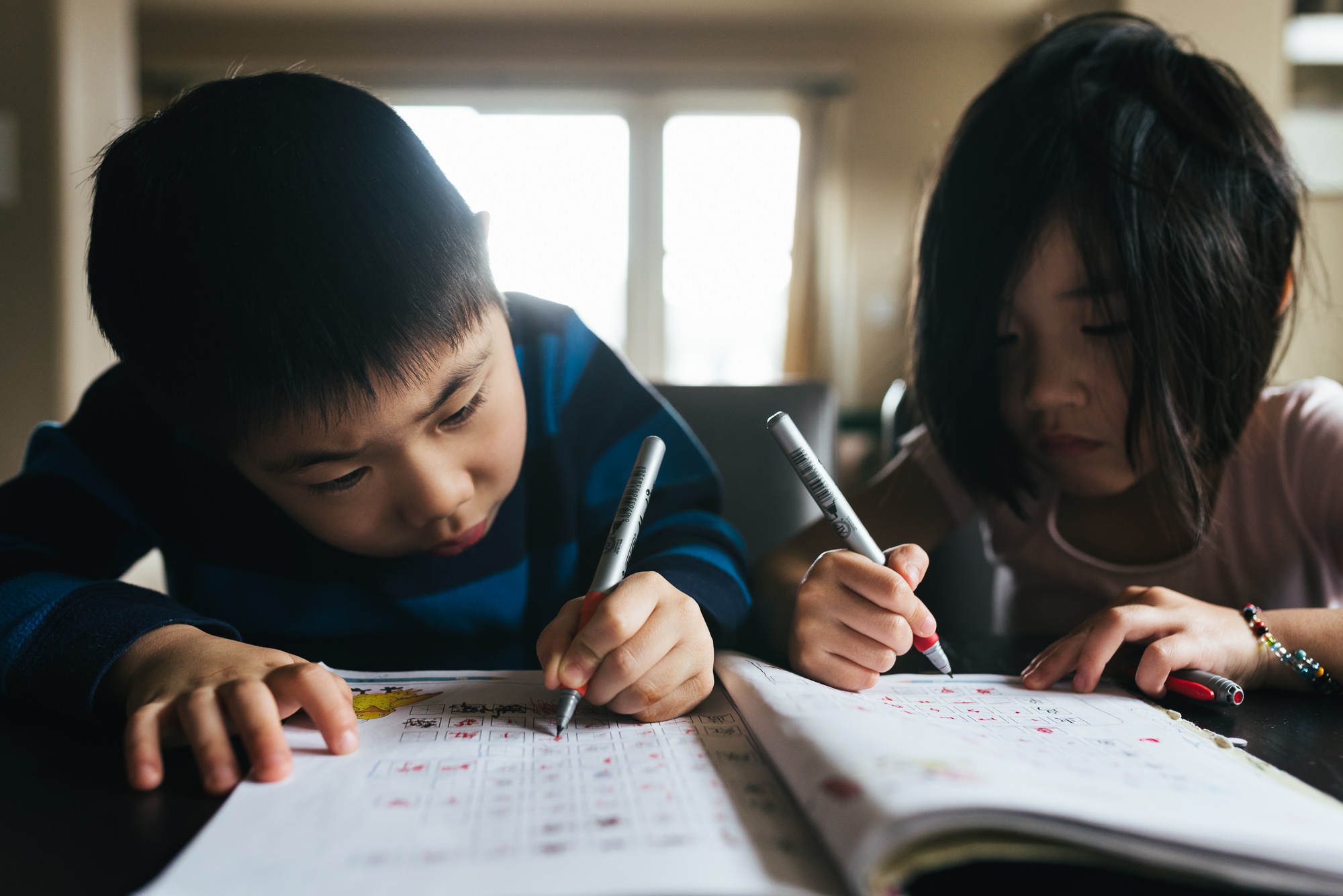 kids doing school work - Documentary Family Photography