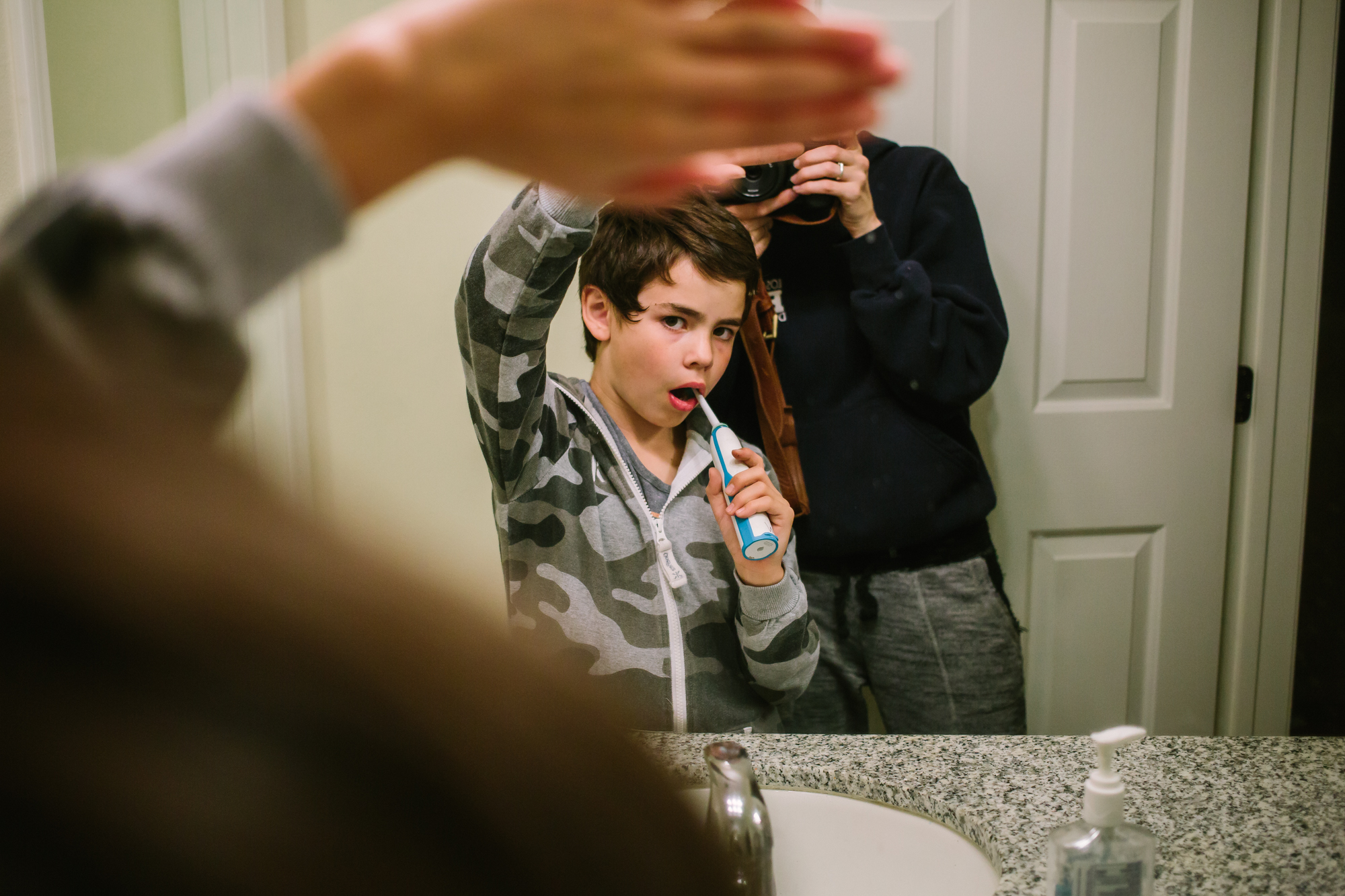 boy brushing teeth - Documentary Family Photography
