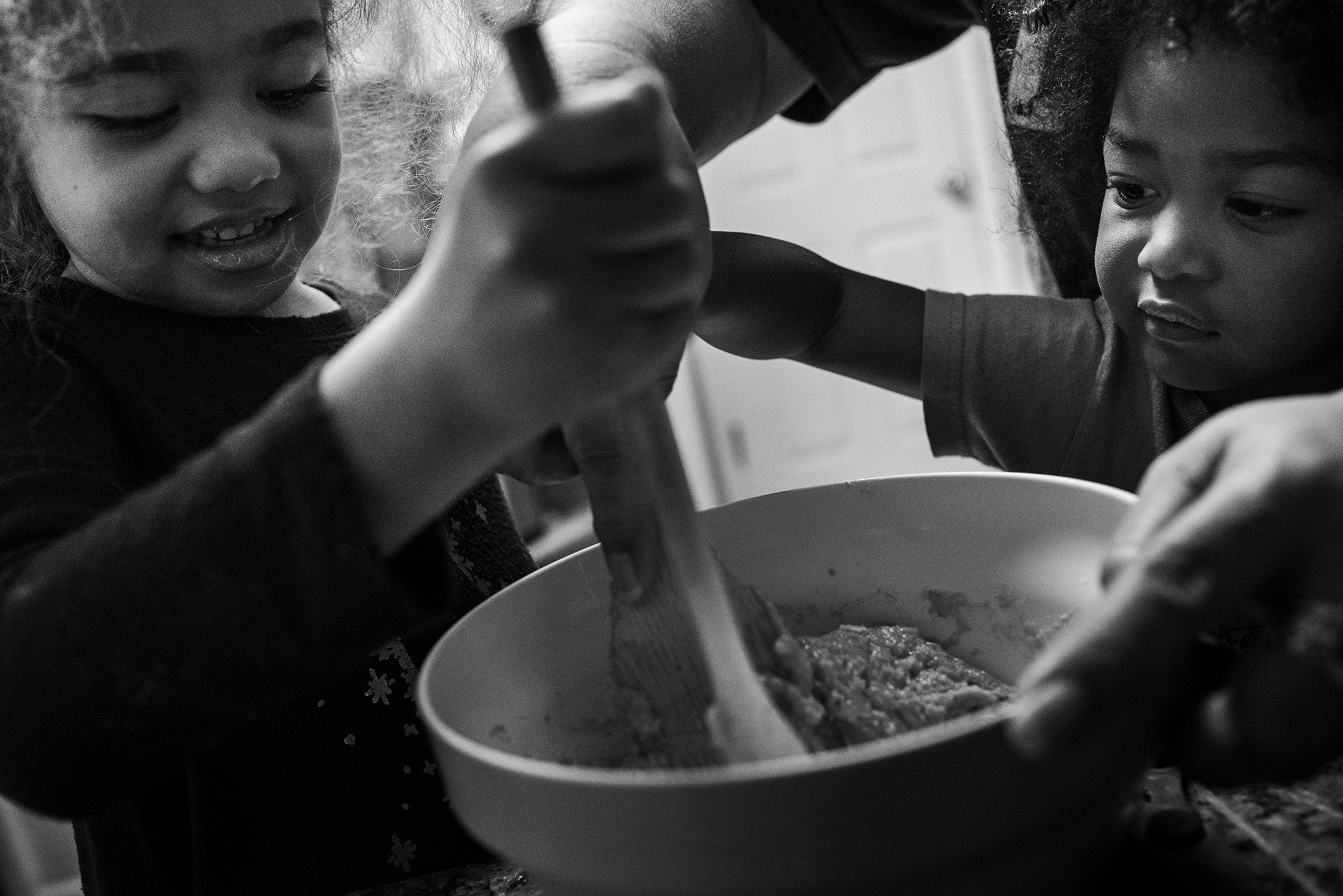 kids stirring dough - Documentary Family Photography