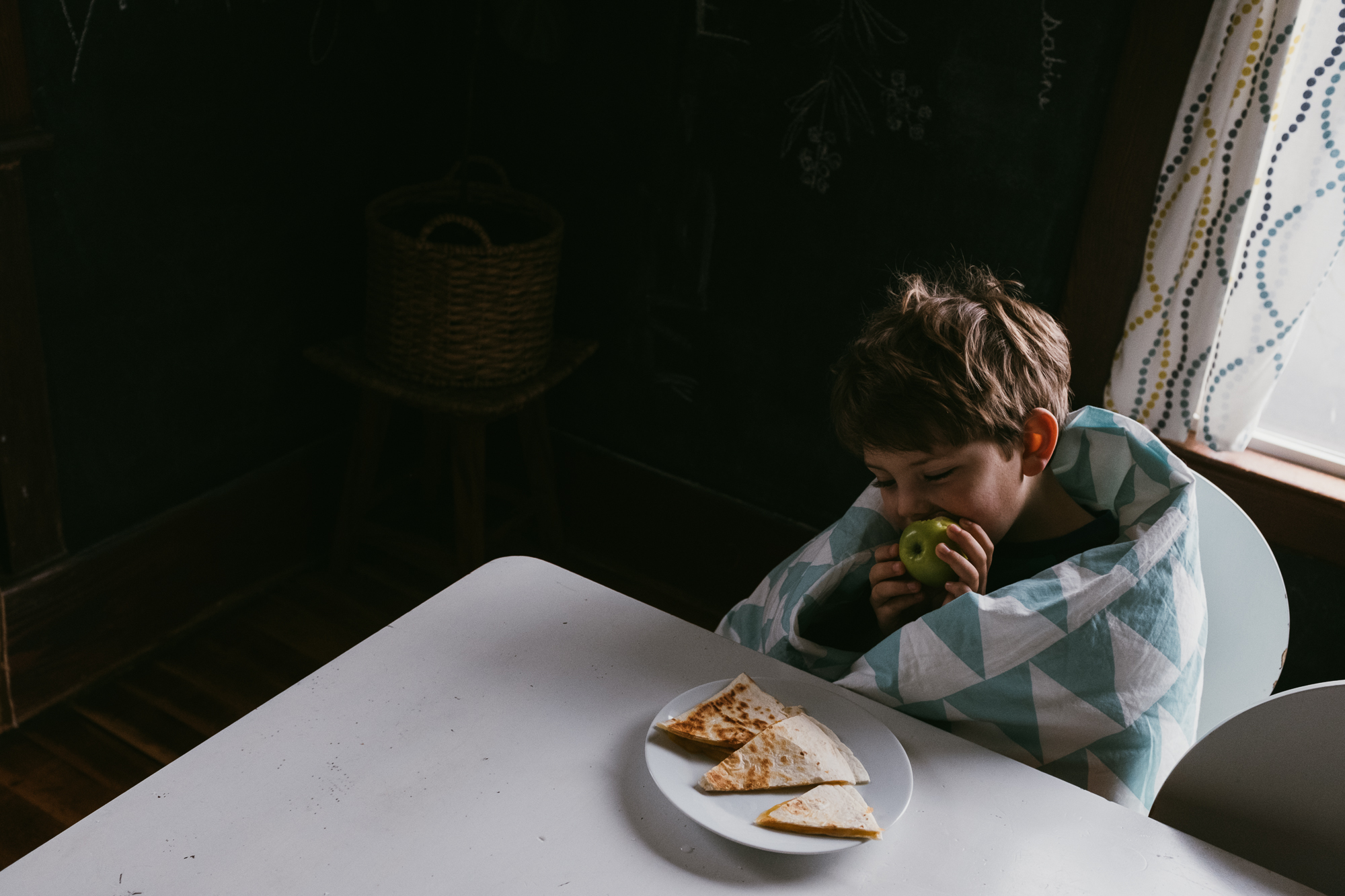 boy with quesadilla - Documentary Family Photography