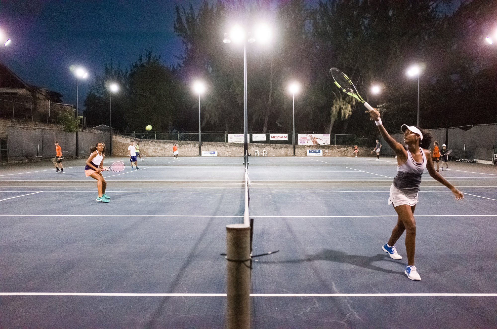 Girls playing tennis - Documentary Family Photography