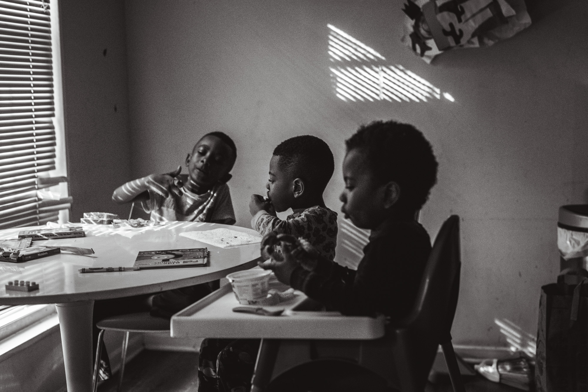 boys eating dinner -documentary family photography