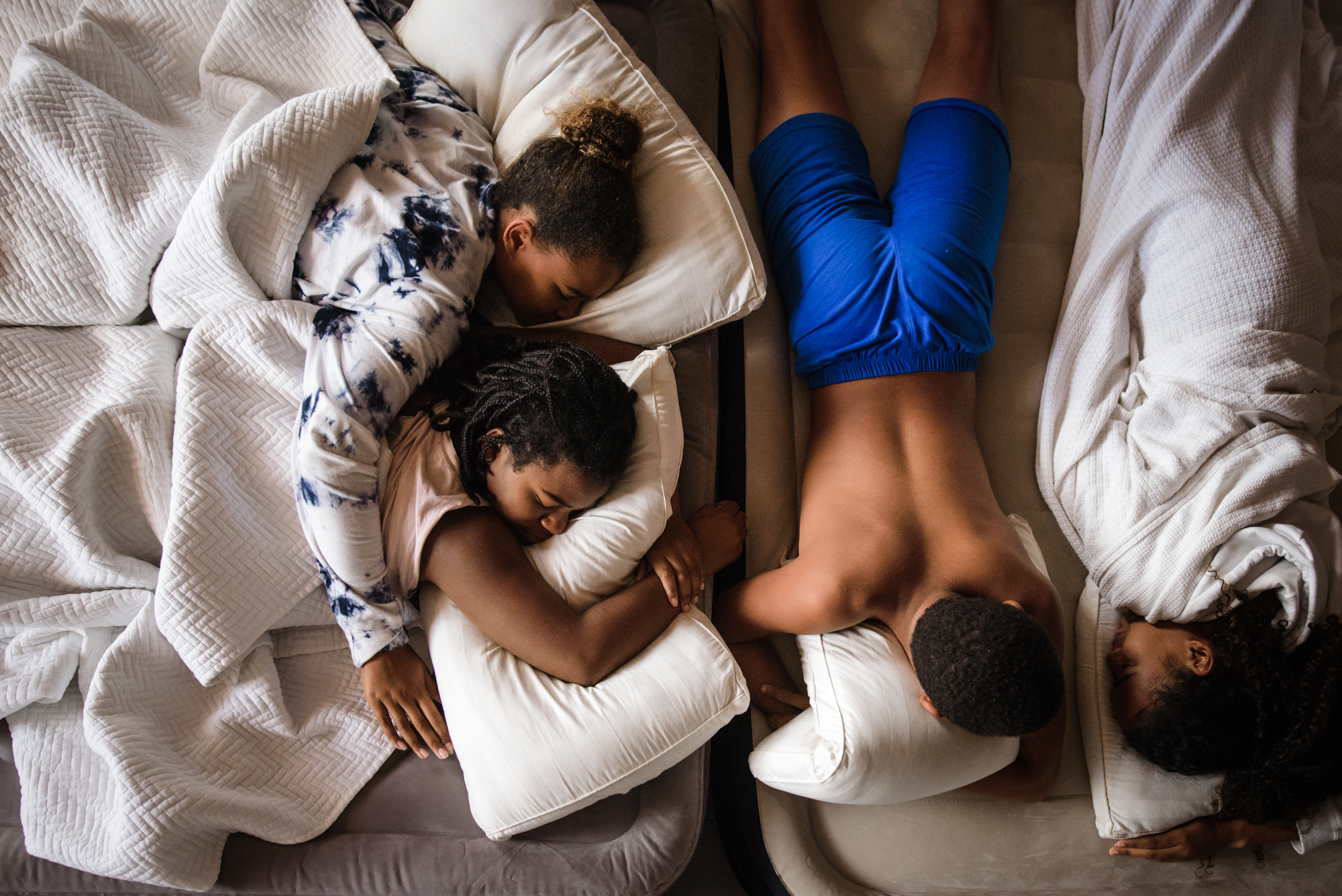 Family sleeping together - documentary family photography