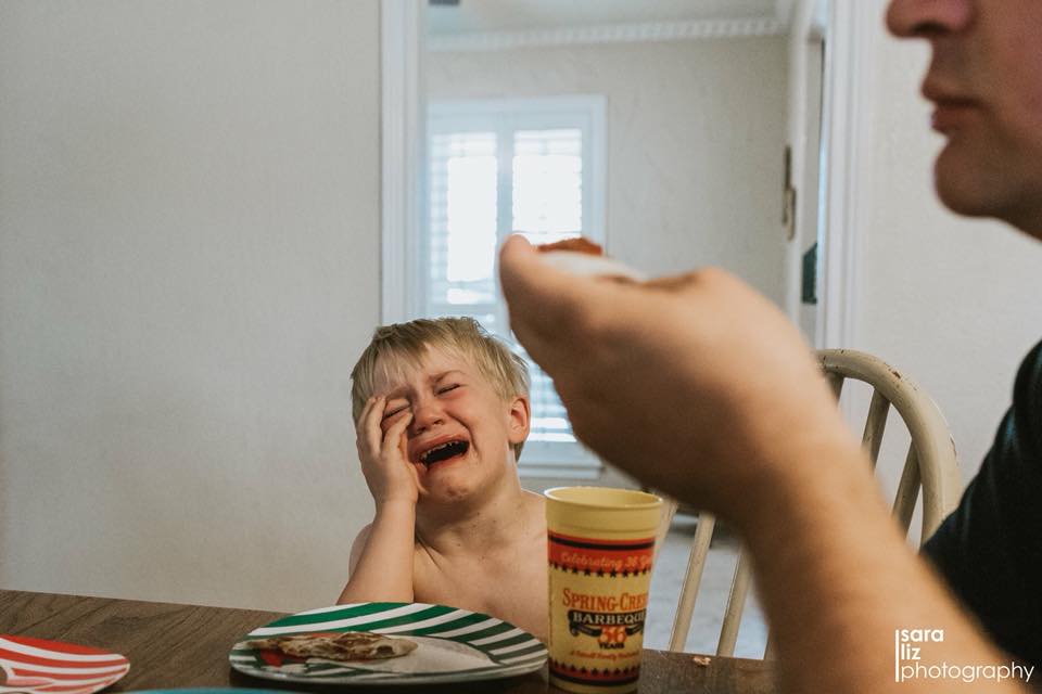 kid crying over dinner