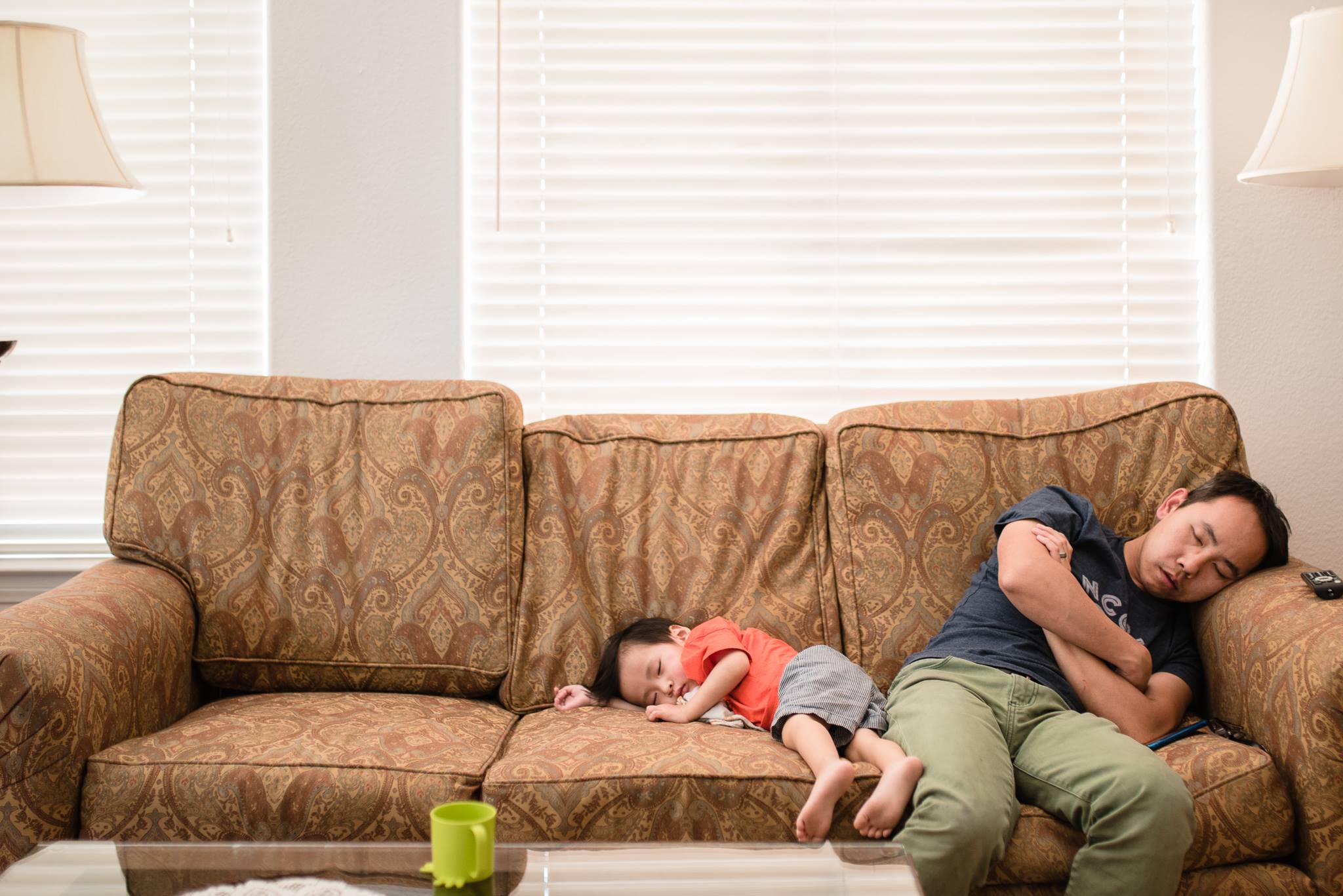 father and toddler asleep on couch - Documentary Family photography