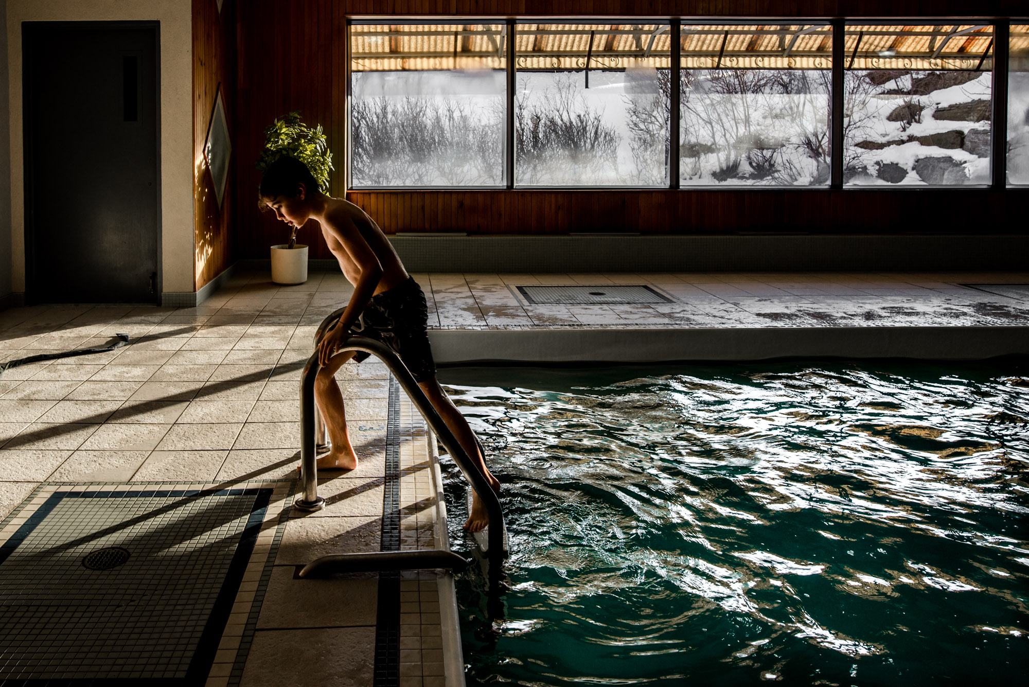 boy leaving pool - Documentary Family Photography