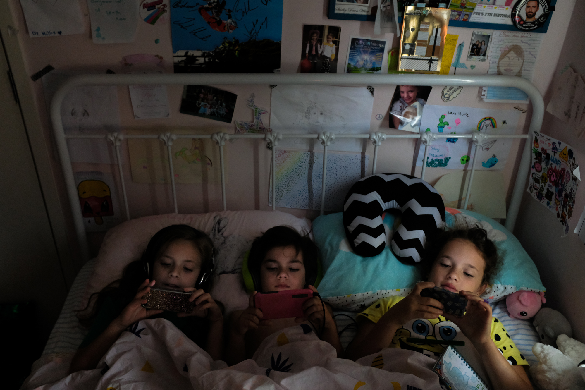 kids in bed with tech - Documentary Family Photography