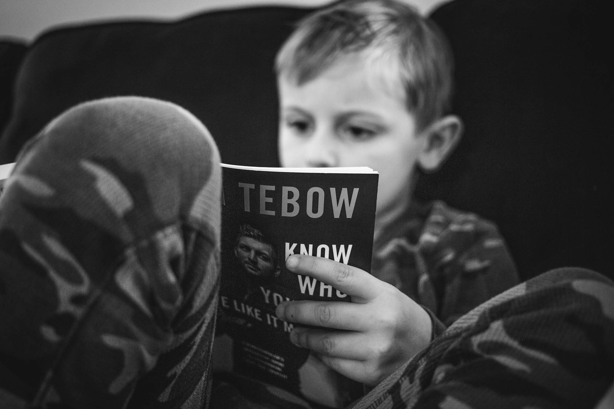 boy reading - Documentary Family Photography