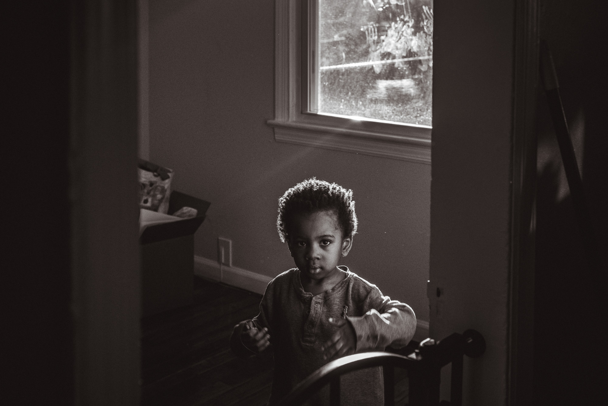 little boy in pretty light - documentary family photography