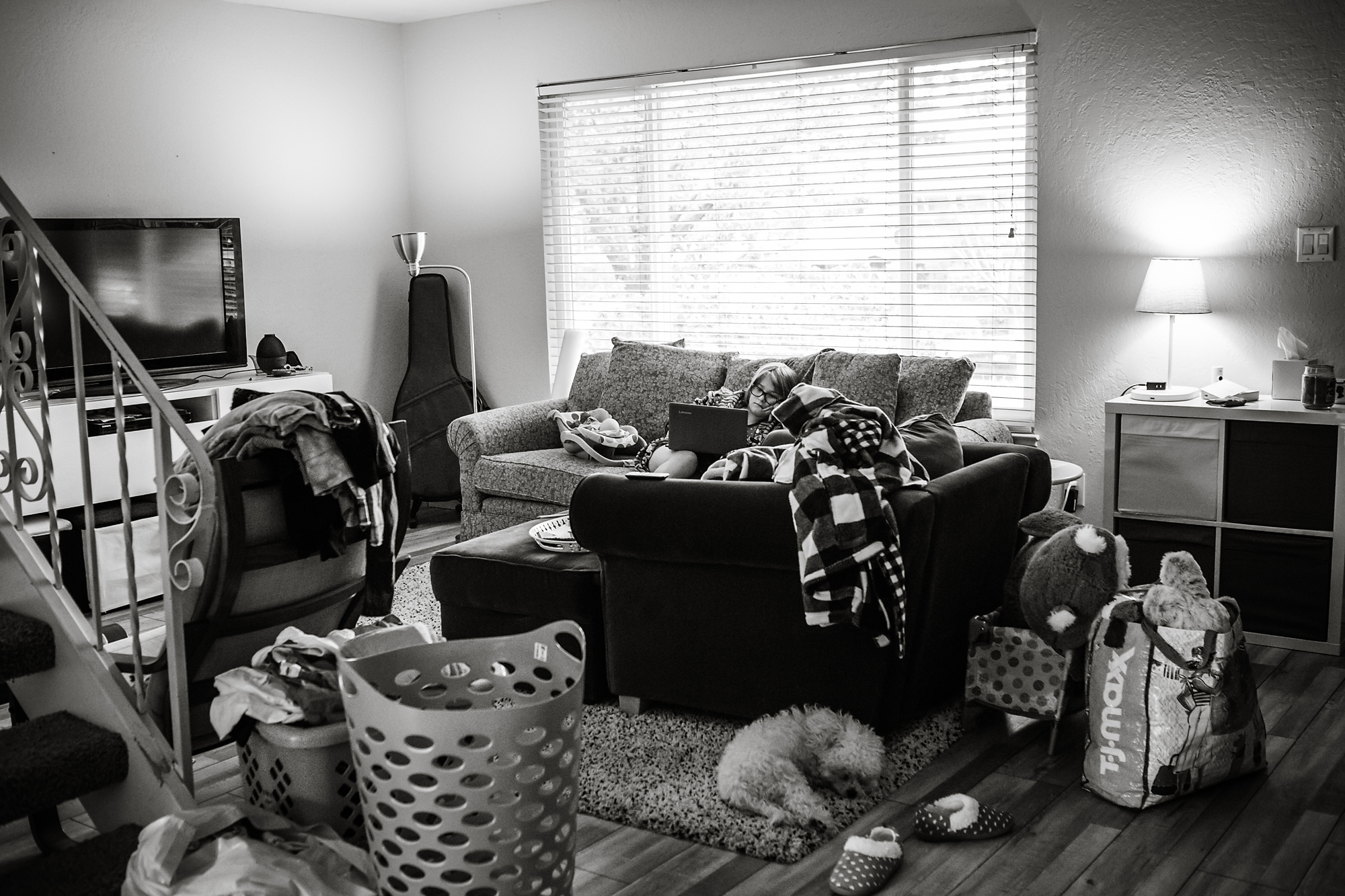 laundry piled up - documentary family photography
