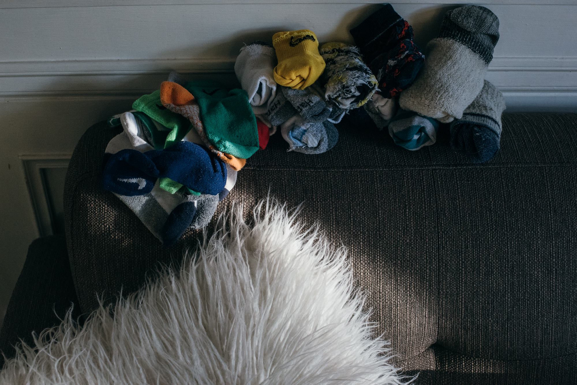 laundry pile - documentary family photography