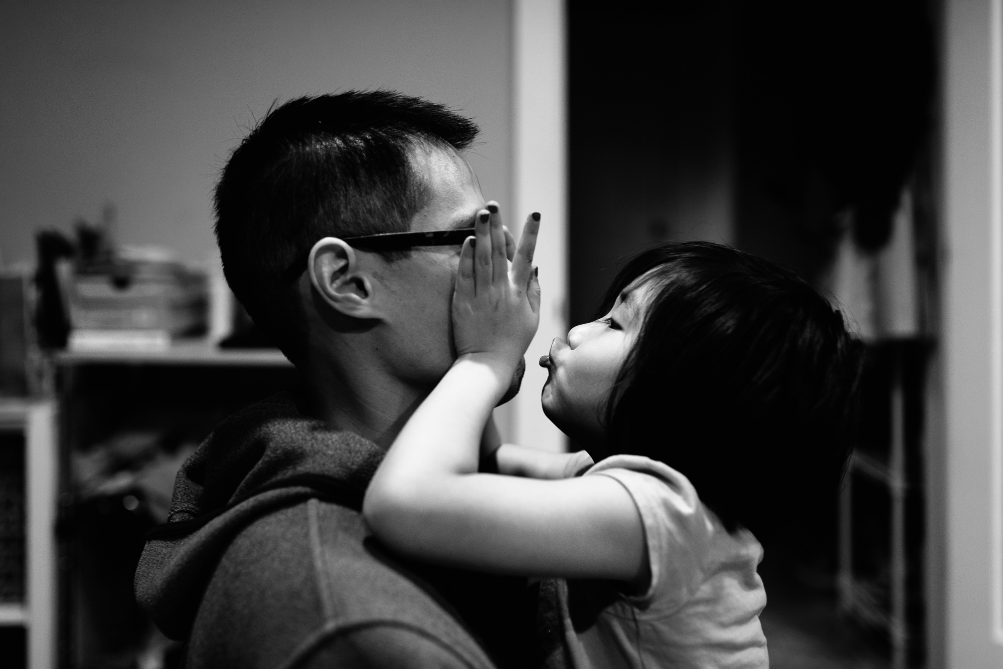 girl making faces at dad - documentary family photography