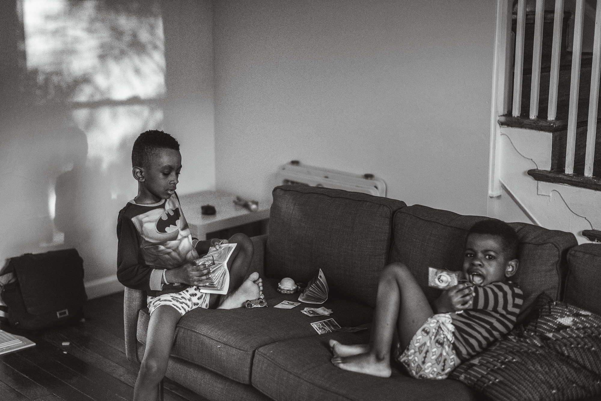 boys sitting on couch - Documentary family photography