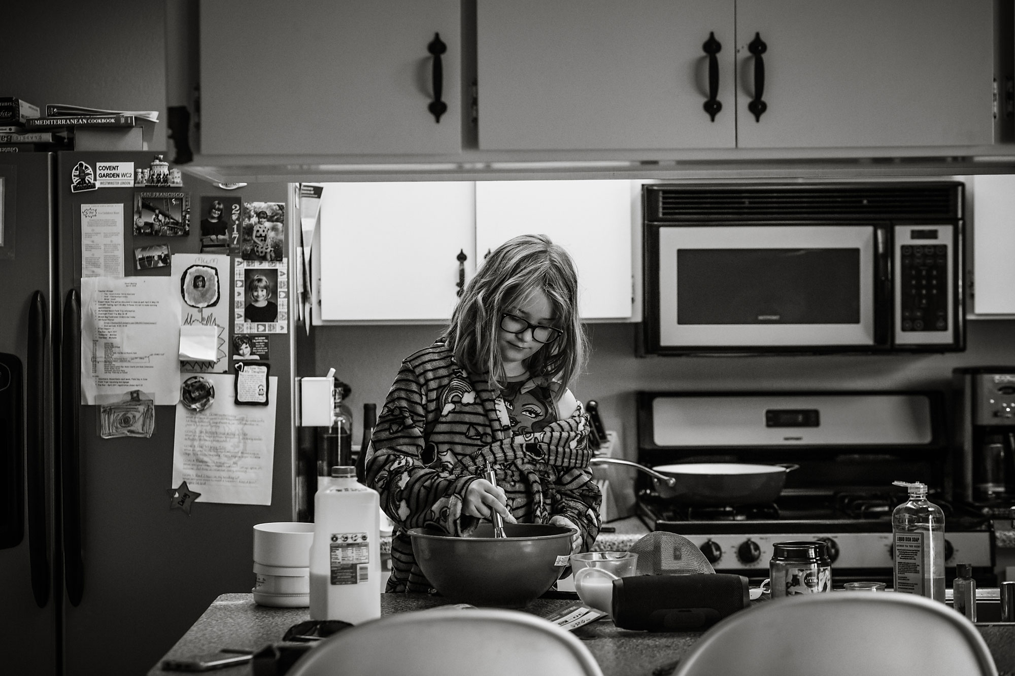 girl cooking - documentary family photography