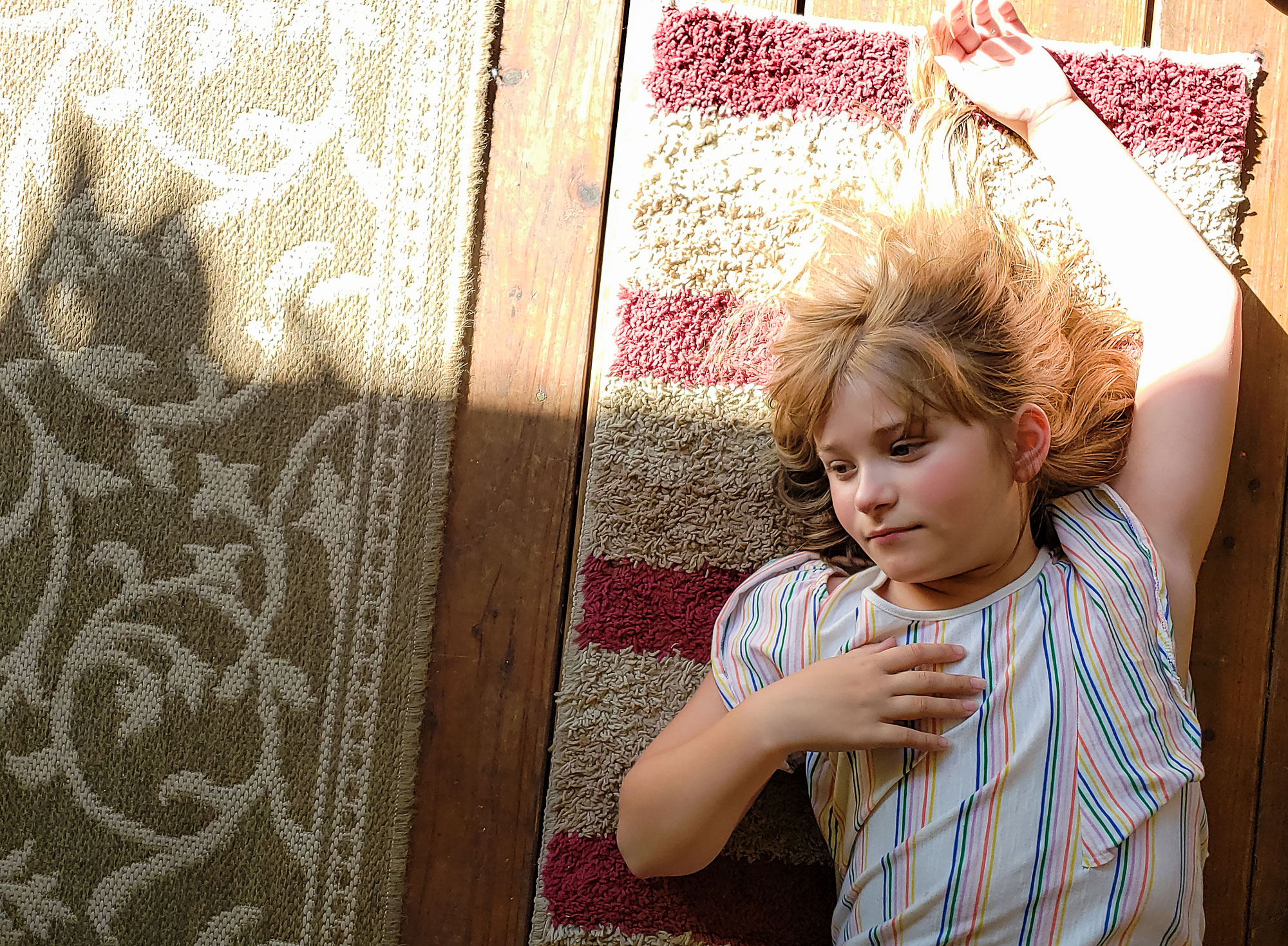 girl sprawled on floor - Documentary Family Photography