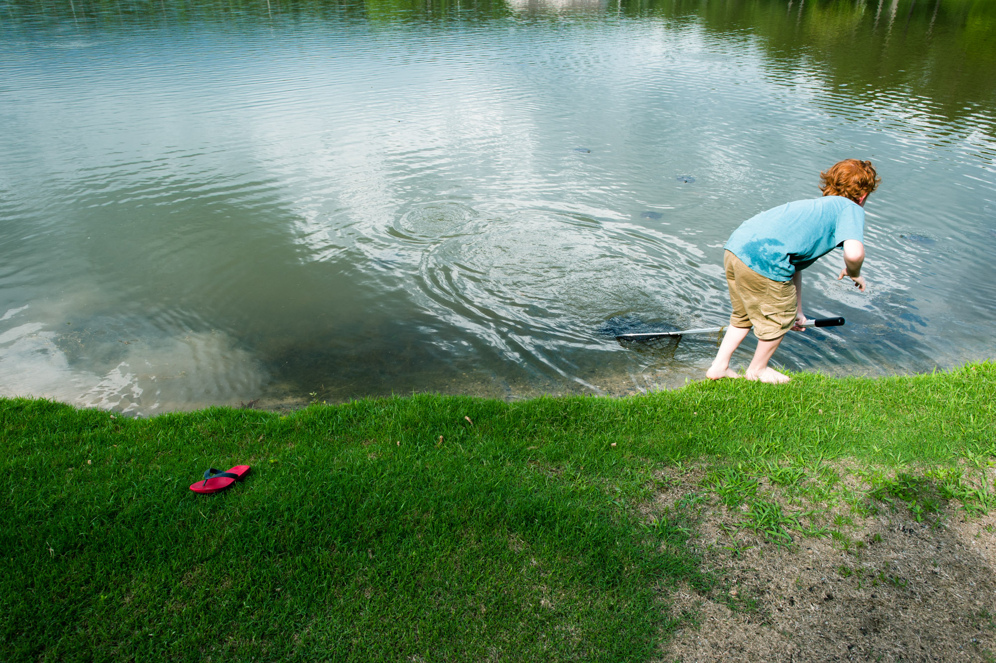 boy on shoreline - Documentary Family Photography