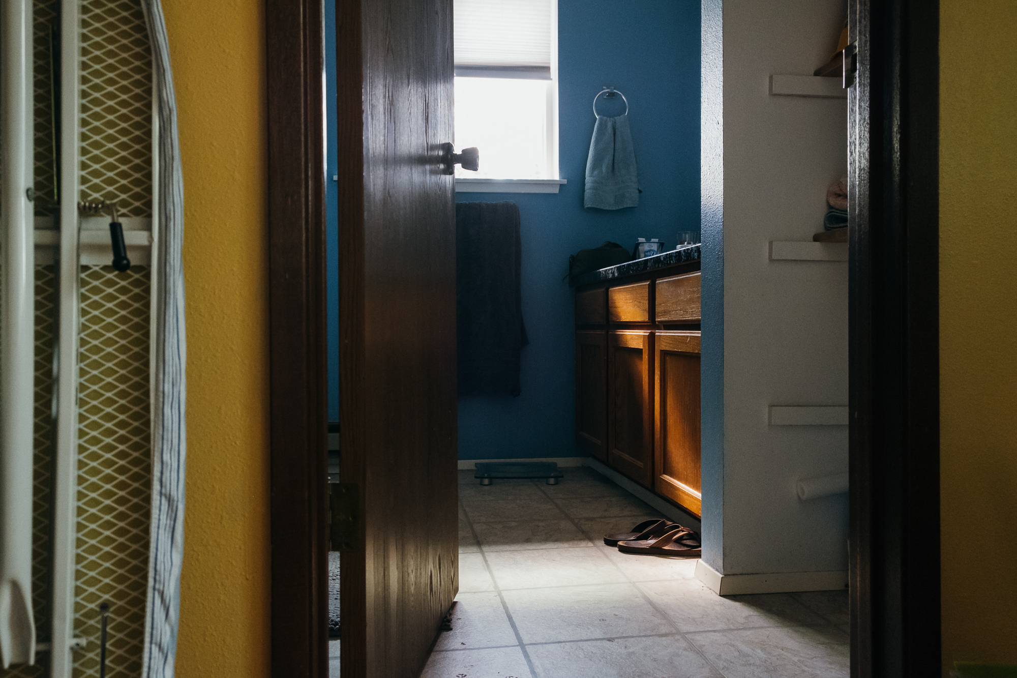 sandals in bathroom - documentary family photography