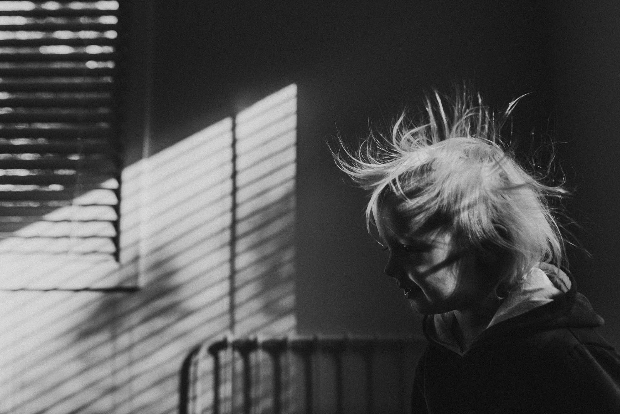 girl with static hair - documentary family photography