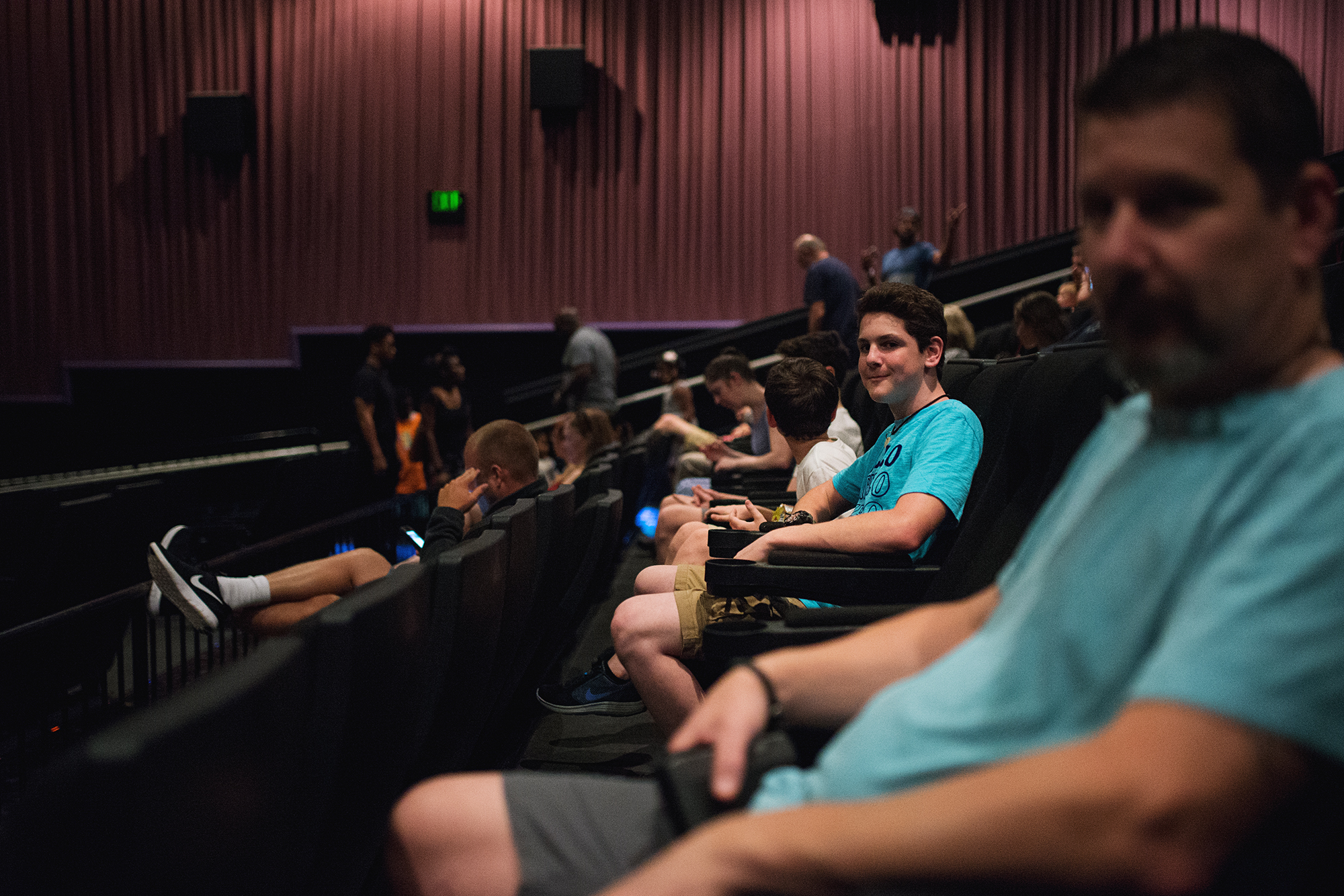 family at movie theater - documentary family photography