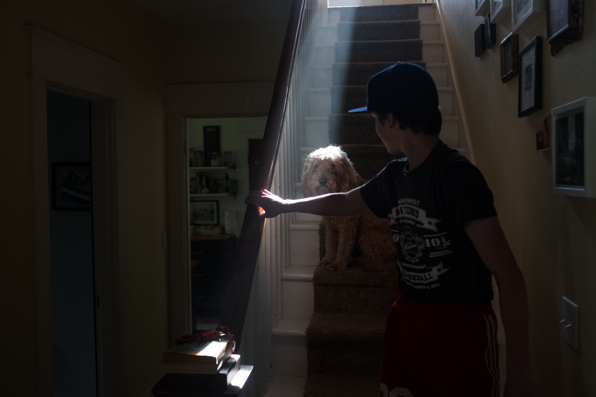 boys and shaft of light - documentary family photography