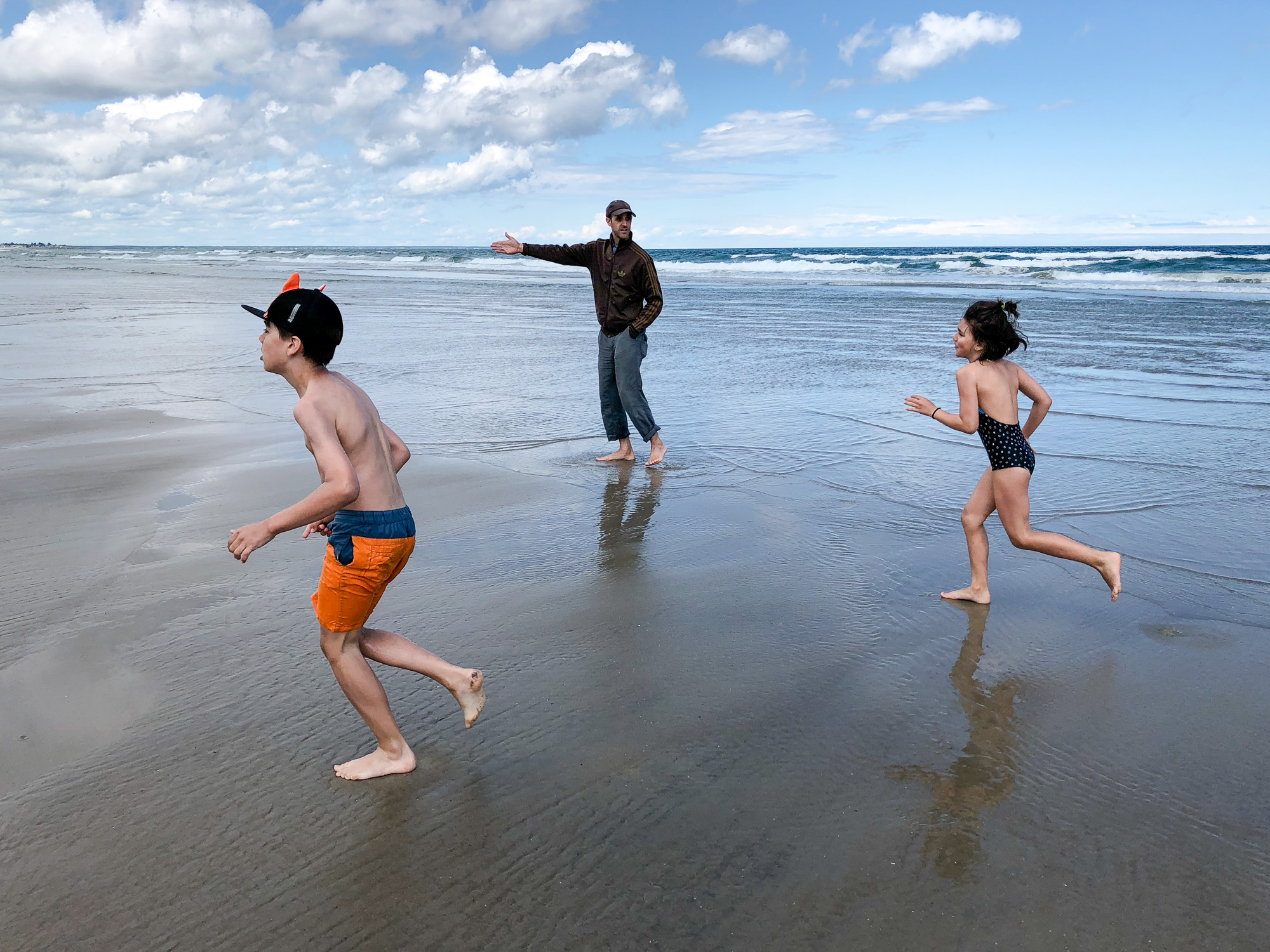kids running on beach - documentary family photography