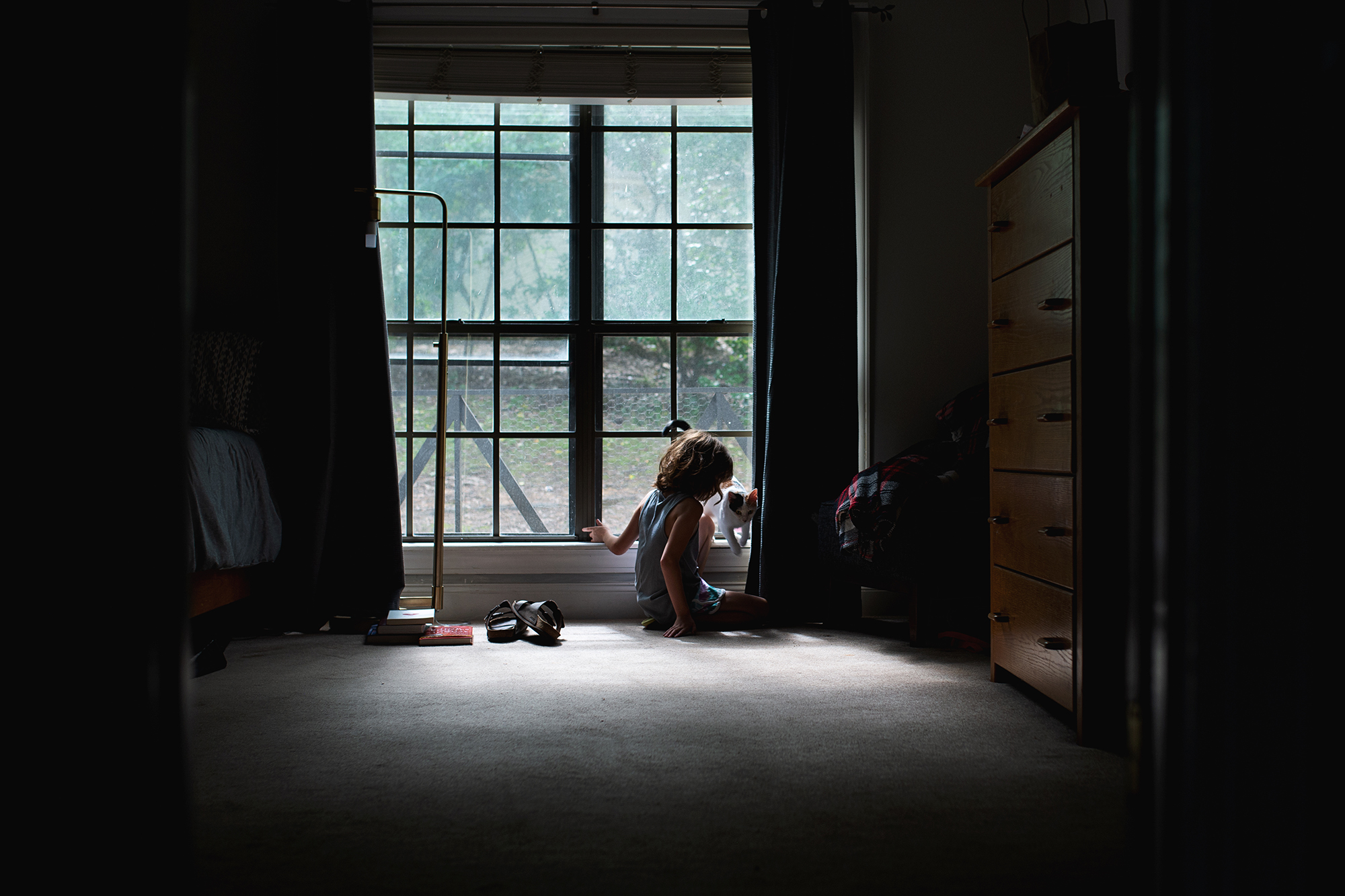 child in window - Documentary Family Photography