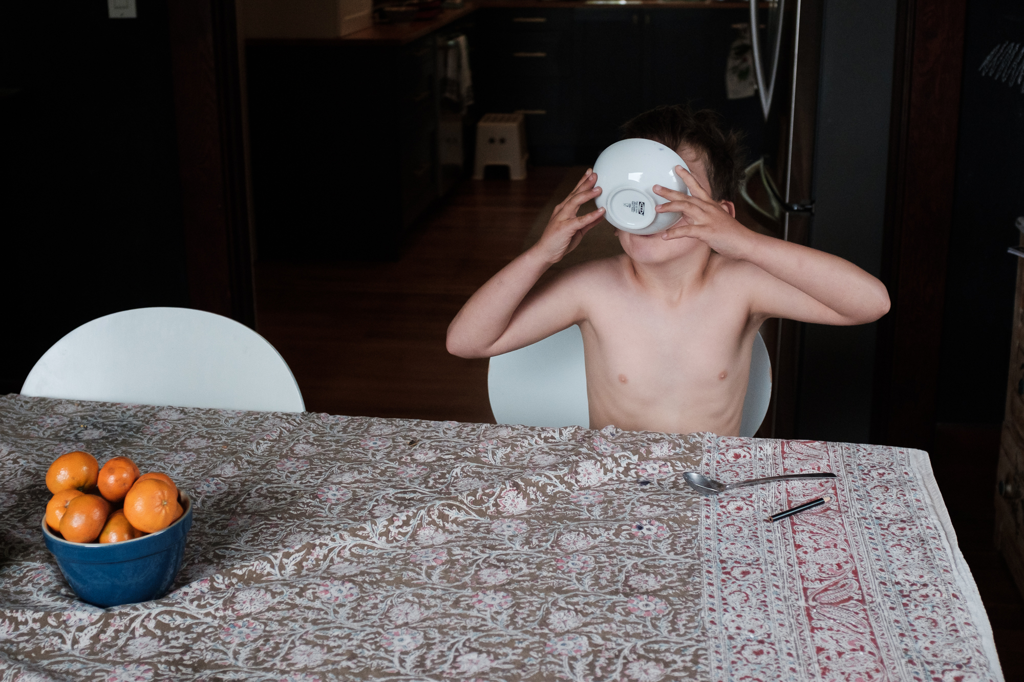 child drinking from bowl - Documentary Family Photography