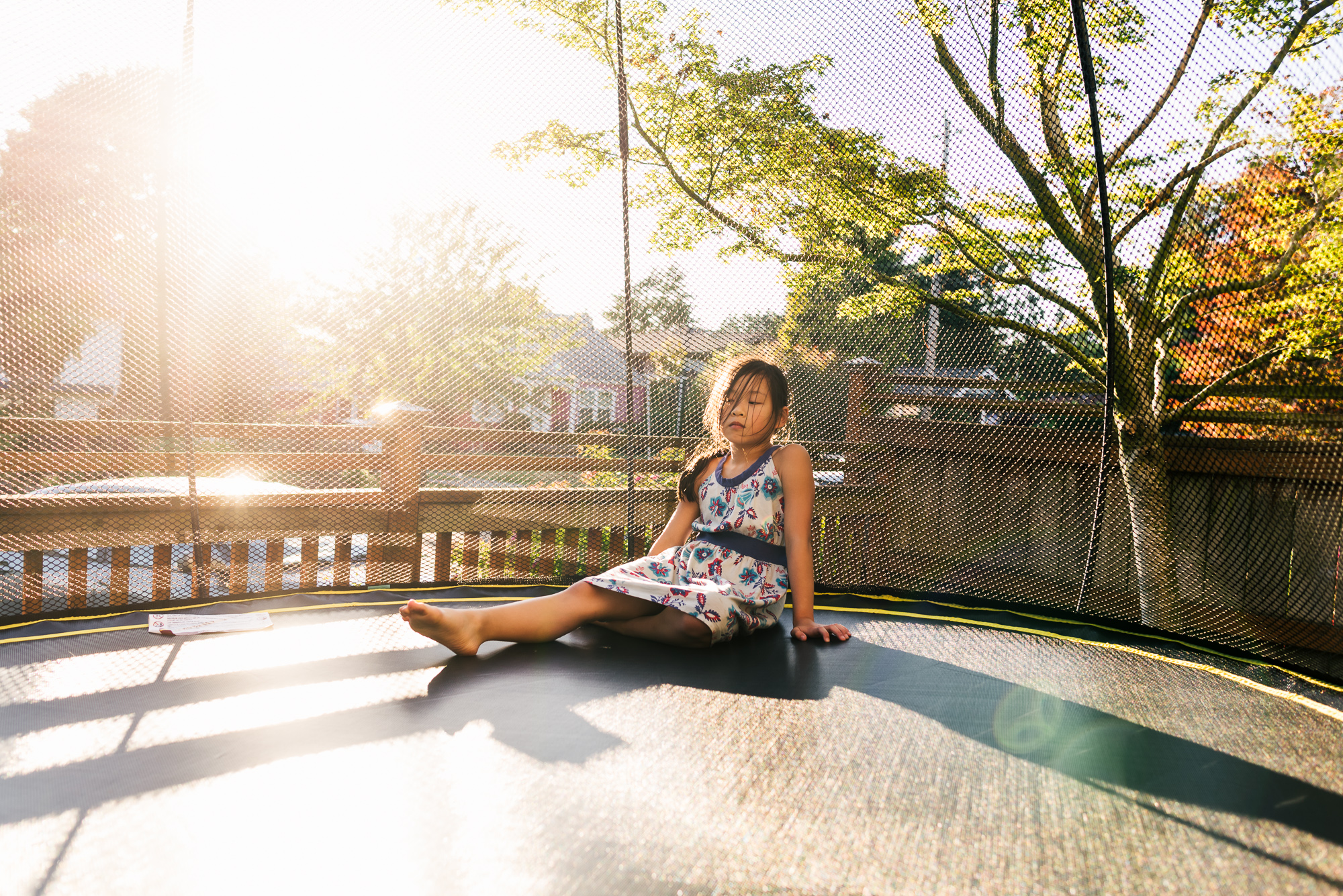 girl on trampoline - Documentary Family Photography