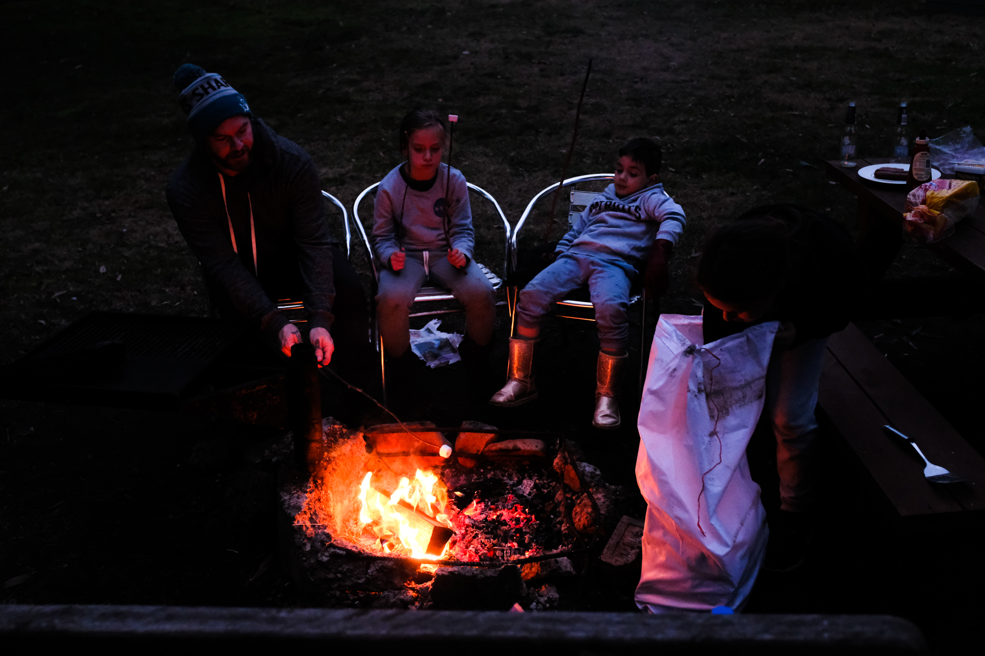 kids around campfire - documentary family photography